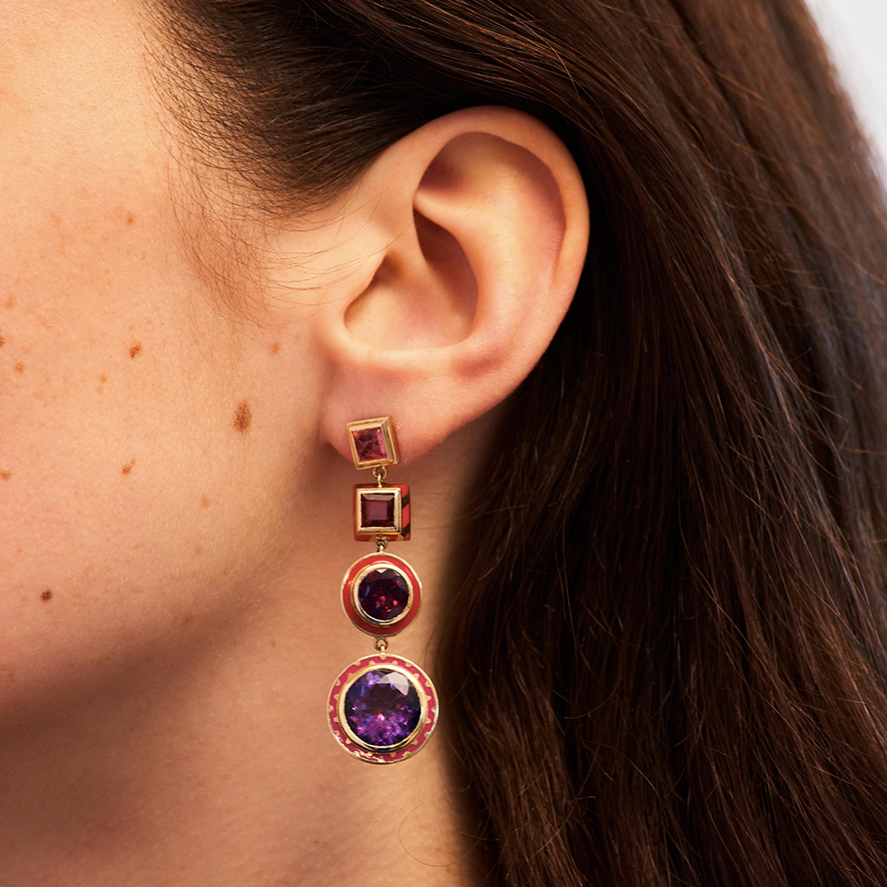Alice Cicolini’s Candy Lacquer Chandelier Earrings feature rhodolite garnets, alongside pink tourmaline sugarloaf, madeira citrines princess, rhodolite garnet and amethyst rounds set in 14 karat yellow gold with lacquer enamel. 

Taking inspiration