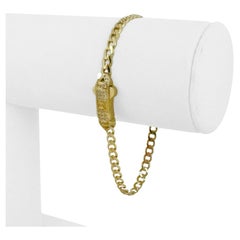 14 Karat Gelbgold Damen Curb Link CZ Armband mit verziertem Verschluss