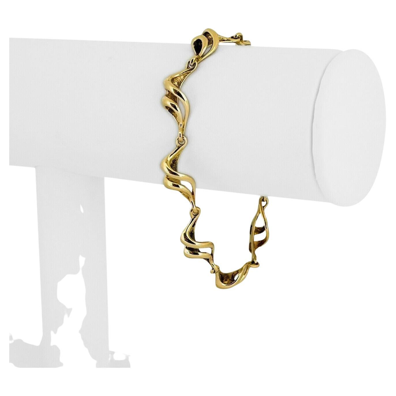 14 Karat Gelbgold Damen-Gliederarmband mit ausgefallenem Wellendesign