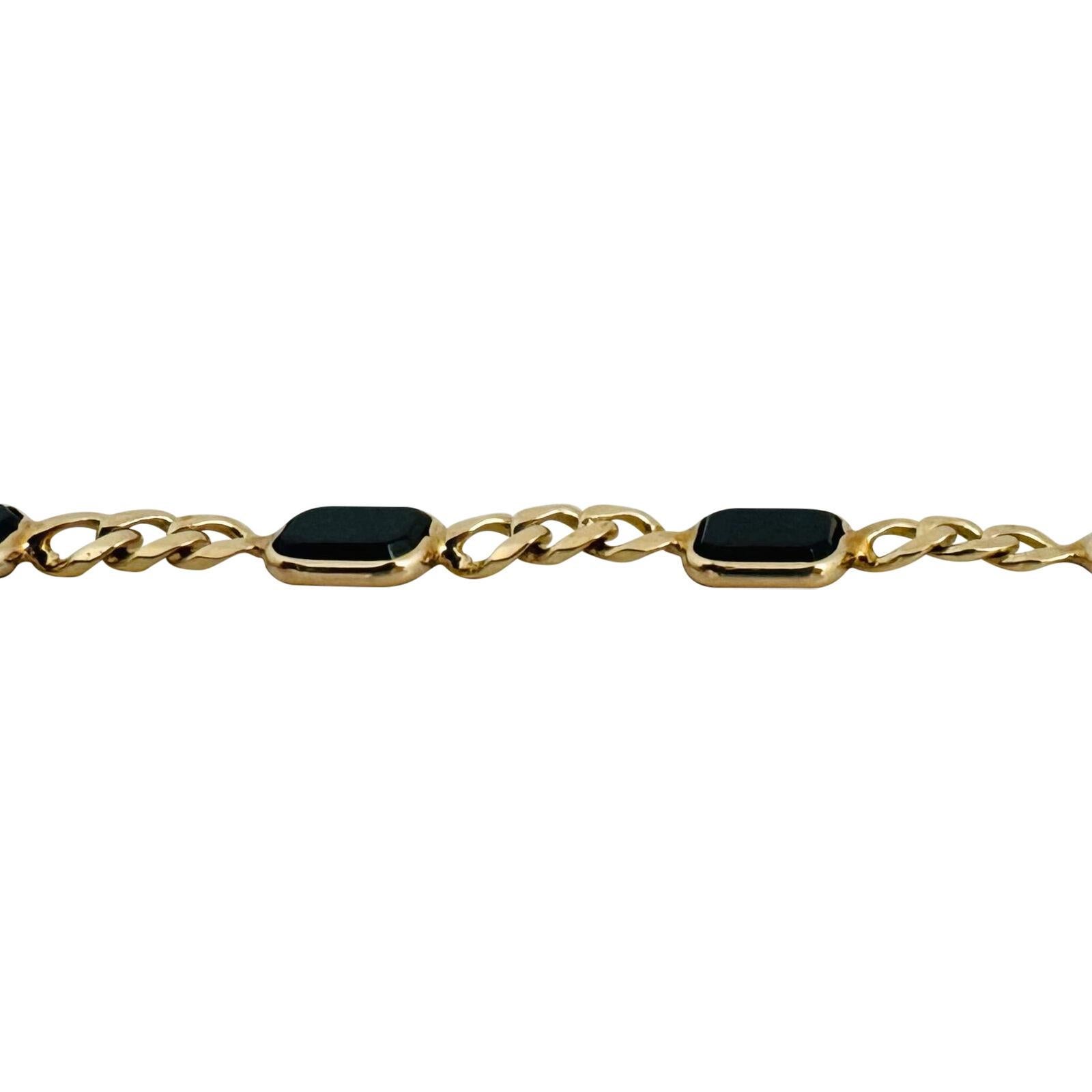 14 Karat Yellow Gold Ladies Onyx Station Curb Link Bracelet  In Good Condition In Guilford, CT