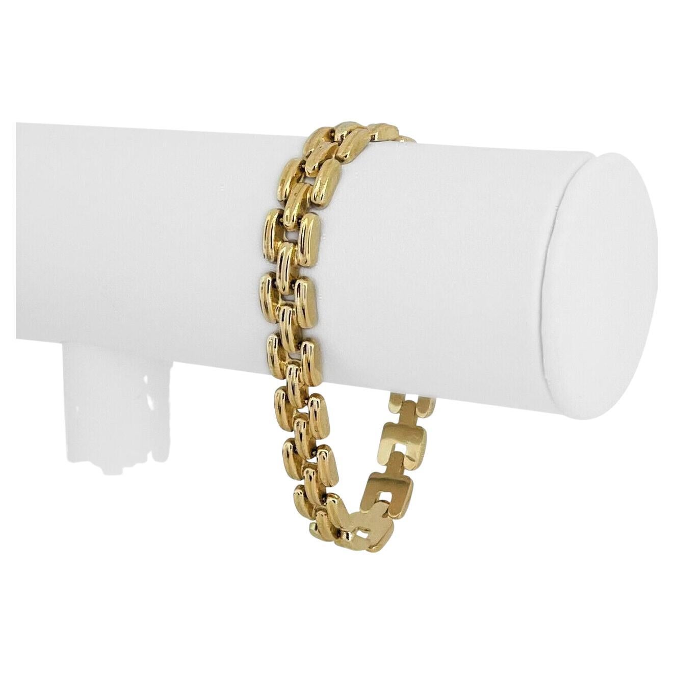 14 Karat Yellow Gold Ladies Polished Panther Bar Link Bracelet For Sale