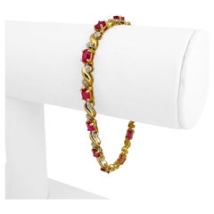 14 Karat Gelbgold Damen-Gliederarmband mit Rubin und Diamanten