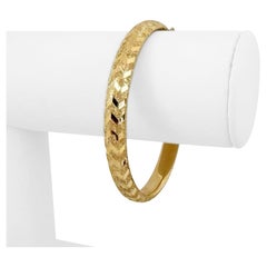 14 Karat Yellow Gold Ladies Sparkling Textured Fancy Bangle Bracelet