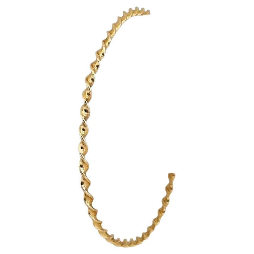14 Karat Yellow Gold Ladies Twisted Spiral Bangle Bracelet
