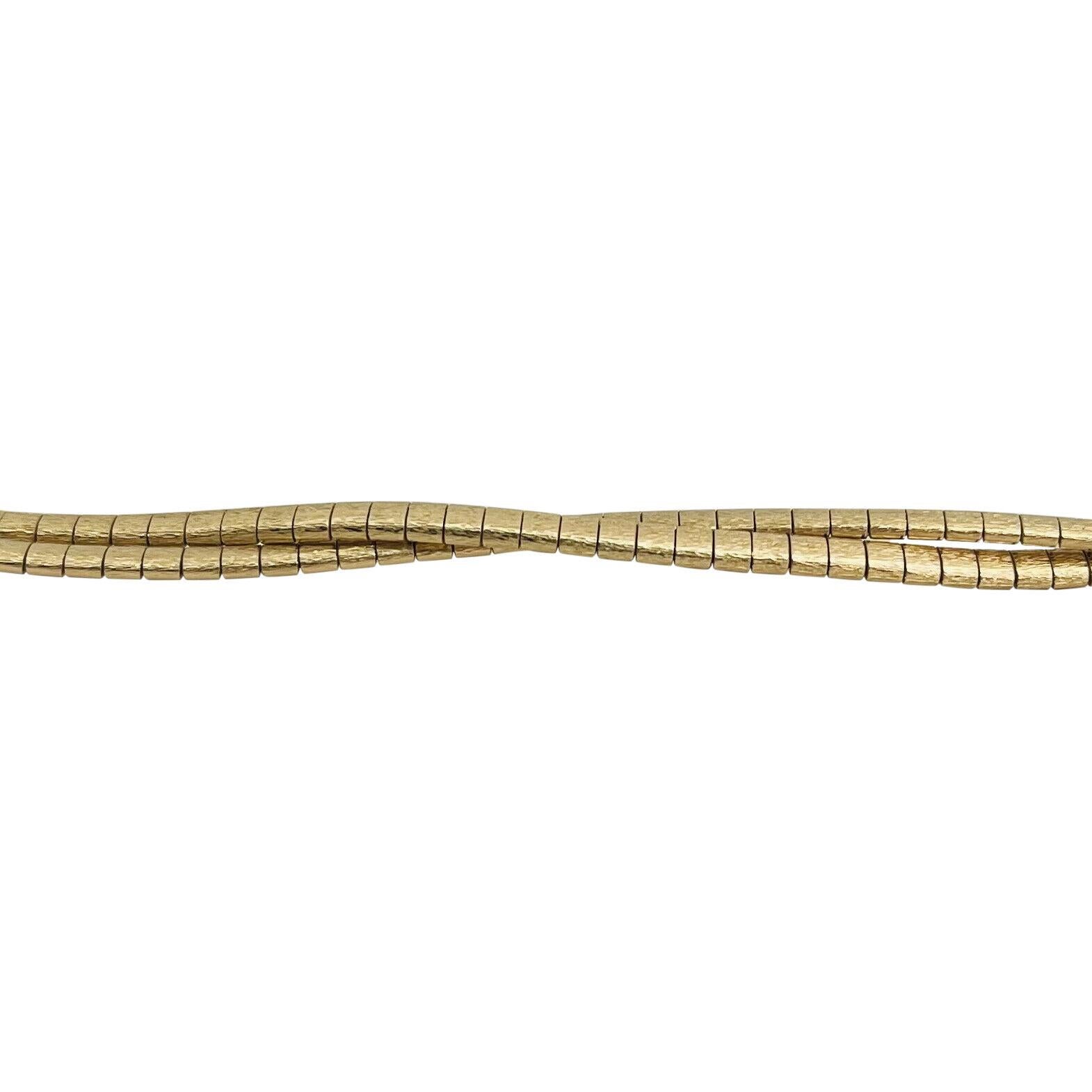 14 Karat Yellow Gold Ladies Two Strand Braided Omega Link Bracelet In Good Condition In Guilford, CT