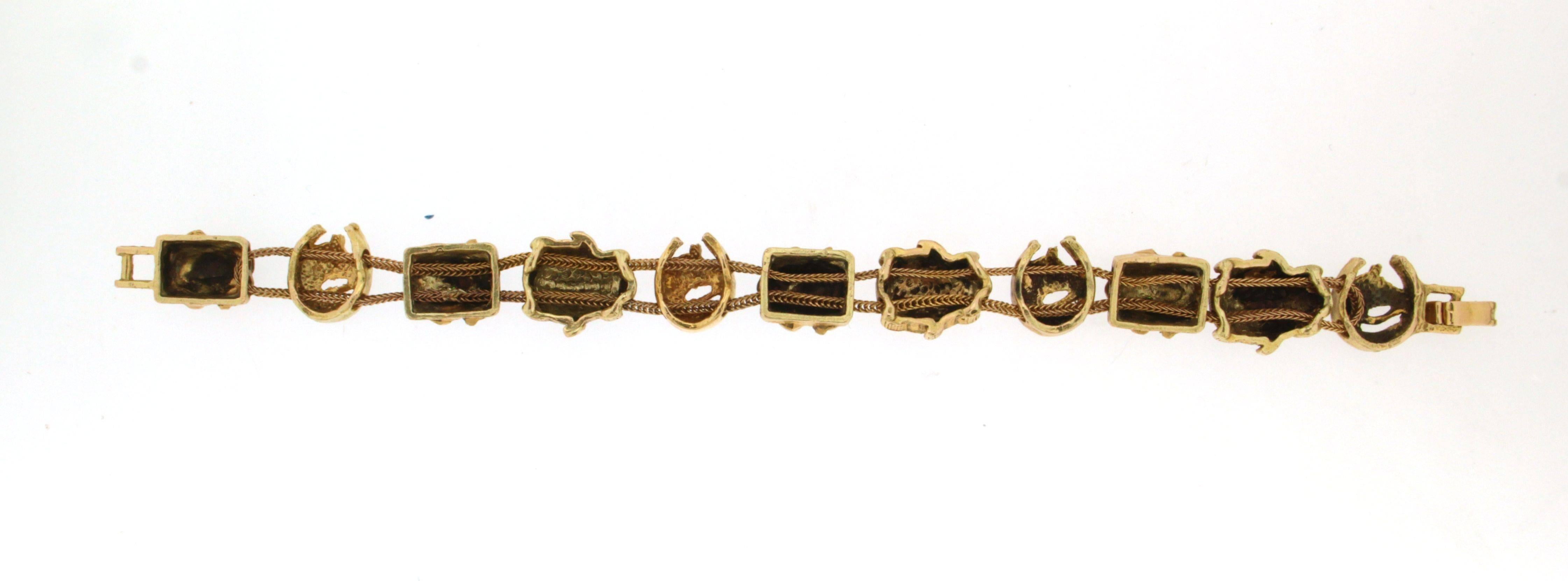 Yellow gold 14 karat ladybrugs and frogs cuff bracelet

Bracelet weight 39 grams
