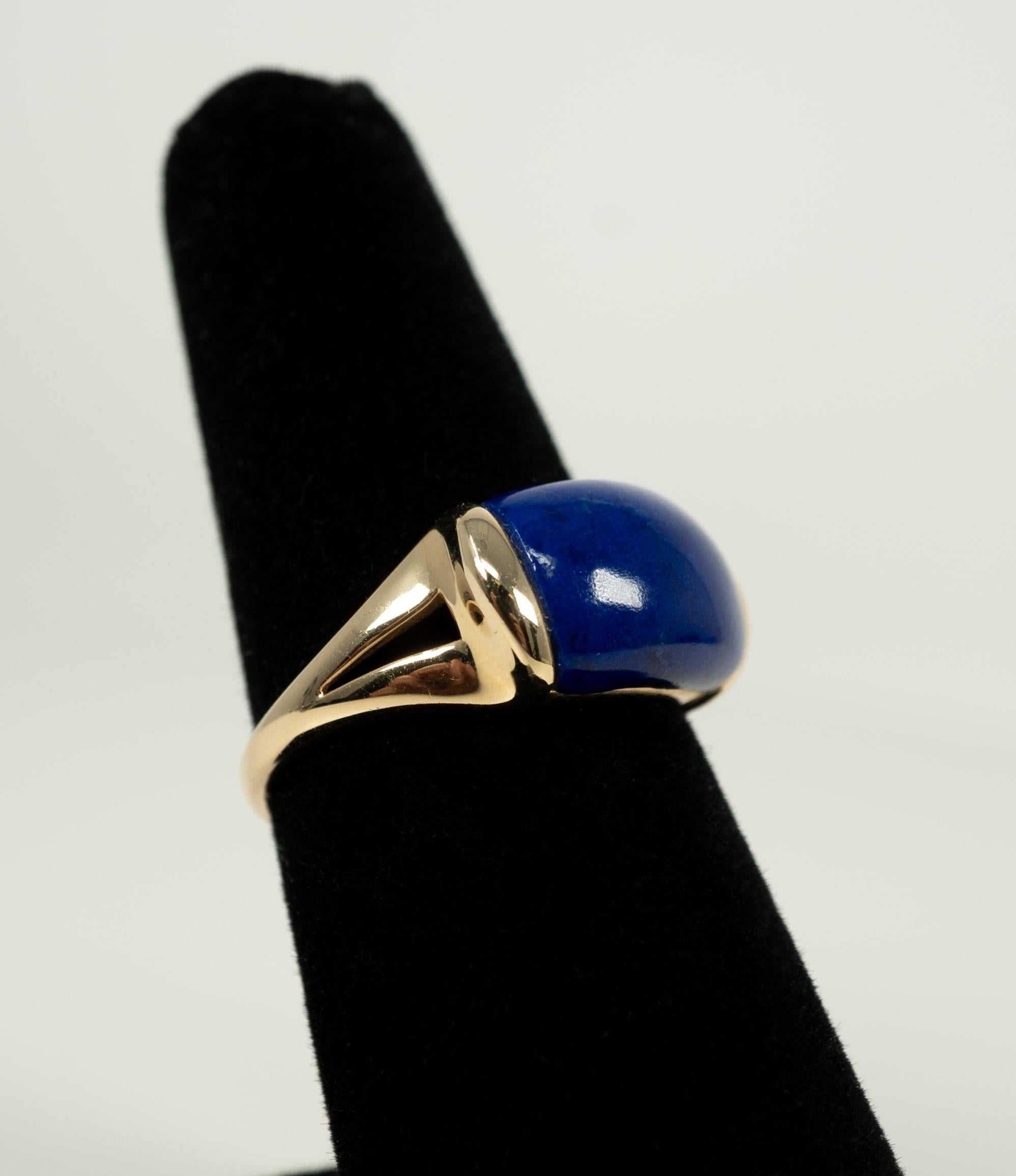 In 14 karat yellow gold, this lovely saddle shaped lapis lazuli just shines!