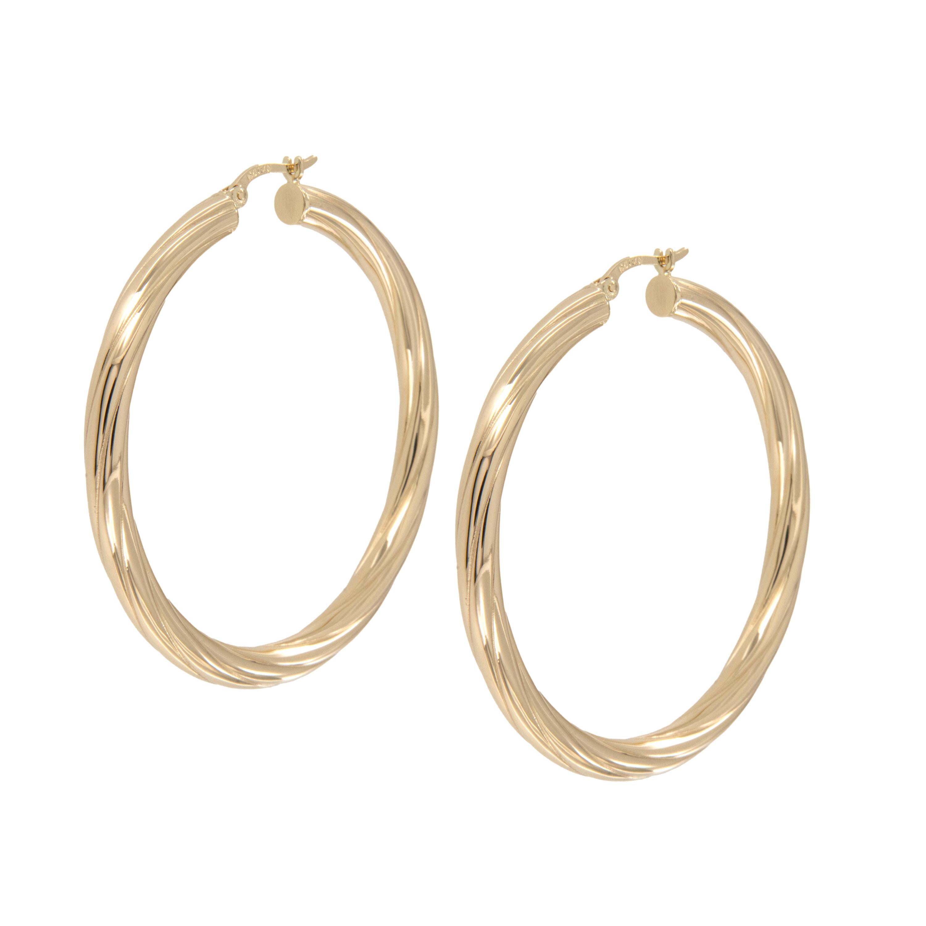 Everyone should have a really nice pair of hoop earrings! A staple in every wardrobe, these 14 karat yellow gold hoop earrings are set apart from the average by having a slightly twisted finish for flair! Hinged curved post for ease of wear.