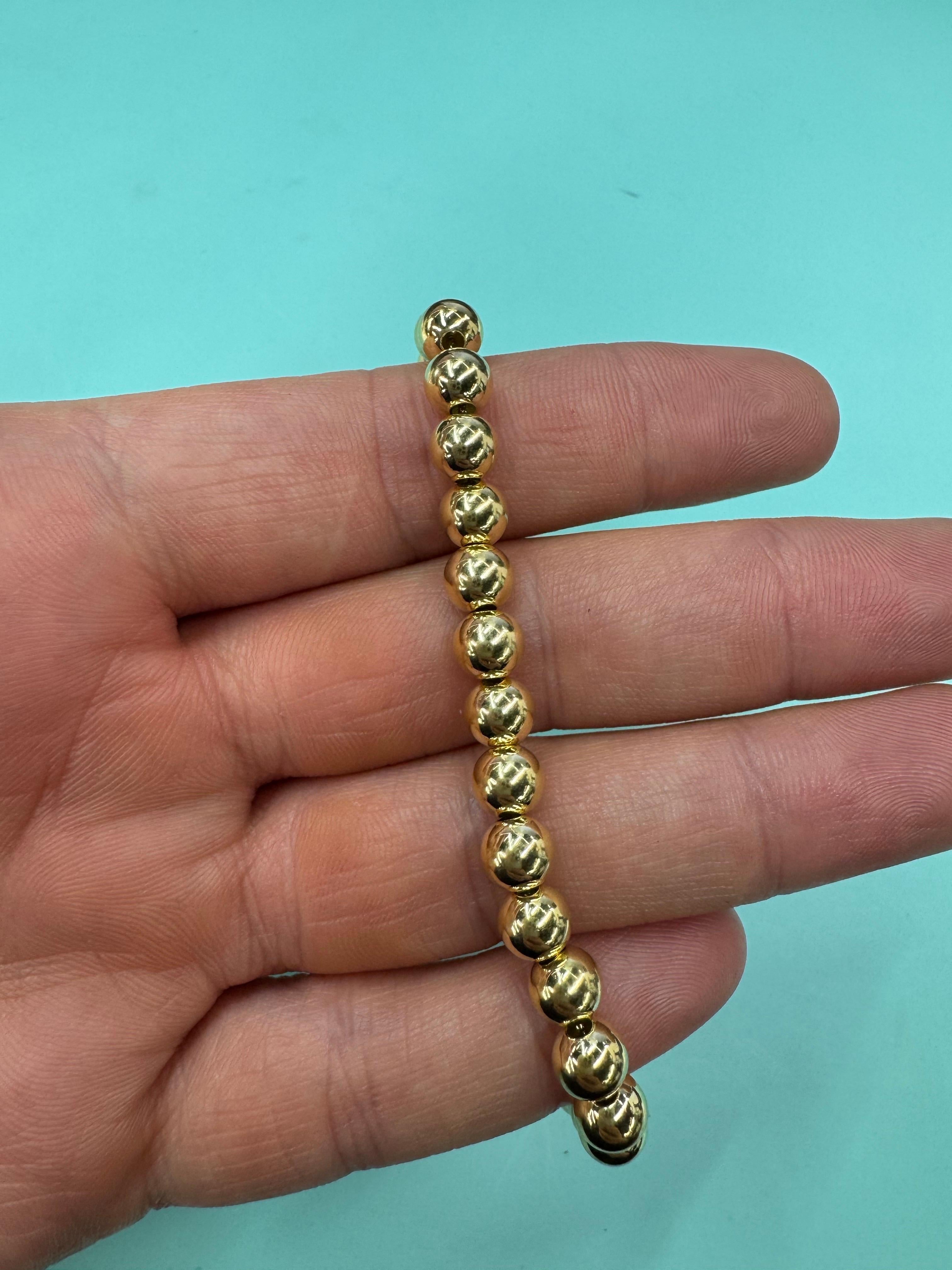 Femenino o masculino Pulsera grande de cadena de bolas de oro amarillo de 14 quilates 6 MM 5,65 gramos en venta
