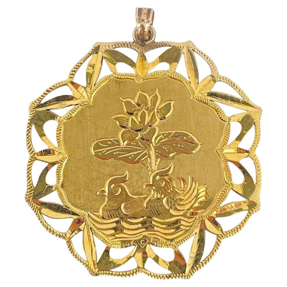 14 Karat Yellow Gold Large Diamond Cut Asian Floral Pendant For Sale