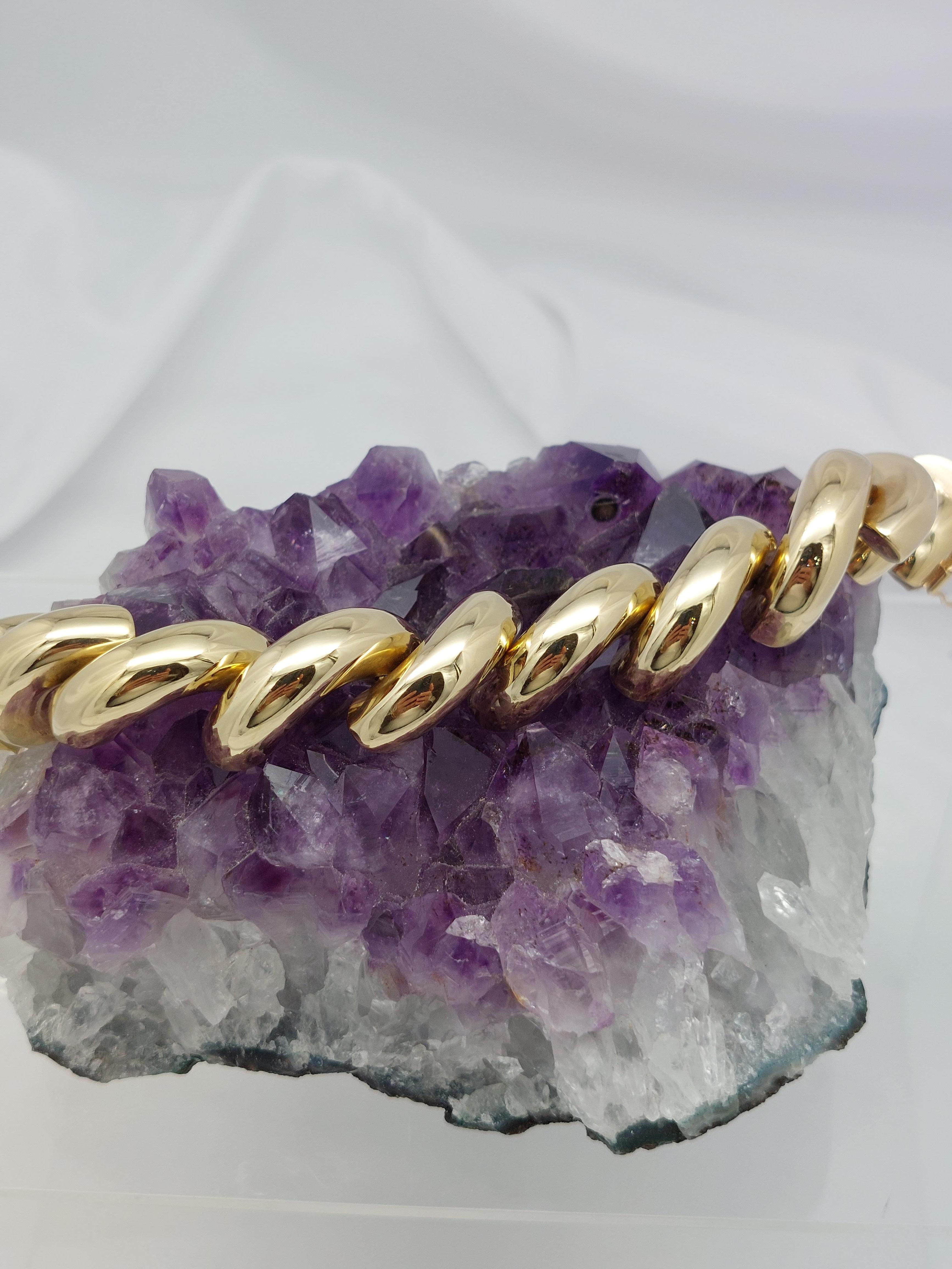 Bracelet à gros maillons......

Bracelet à maillons en or jaune 14 carats San Marco
Excellent état.
Le bracelet mesure 1/2