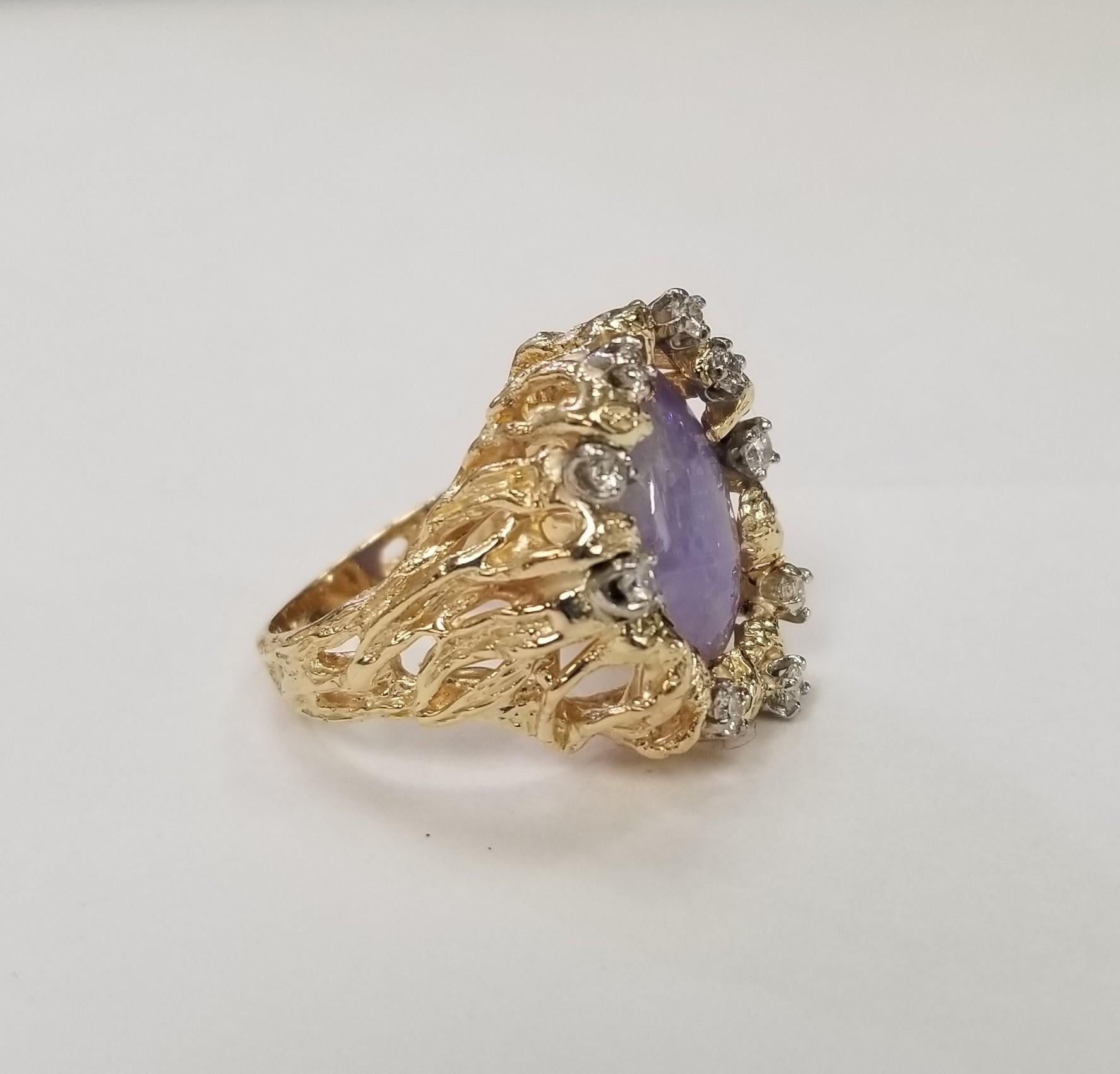 14 Karat Yellow Gold  Lavender Jade and Diamond Cocktail Ring, 1 Lapis 14 x 10.5mm of gem quality and 9 round full cut diamonds of very fine quality weighing .40pts.  This ring is a size 6 but we will size to fit for free.
