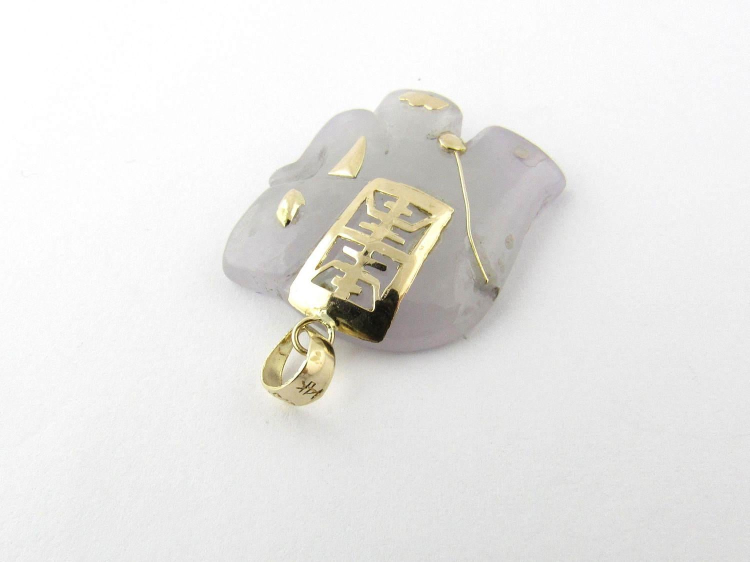 Vintage 14K Yellow Gold Lavender Jade Elephant Pendant. 

This is the perfect gift for the elephant collector. 

This pendant measures approx 20 mm x 3 mm x 23 mm. 

This pendant hangs approx 30 mm from top of loop. 

1 Lavender jade elephant. 

5.5