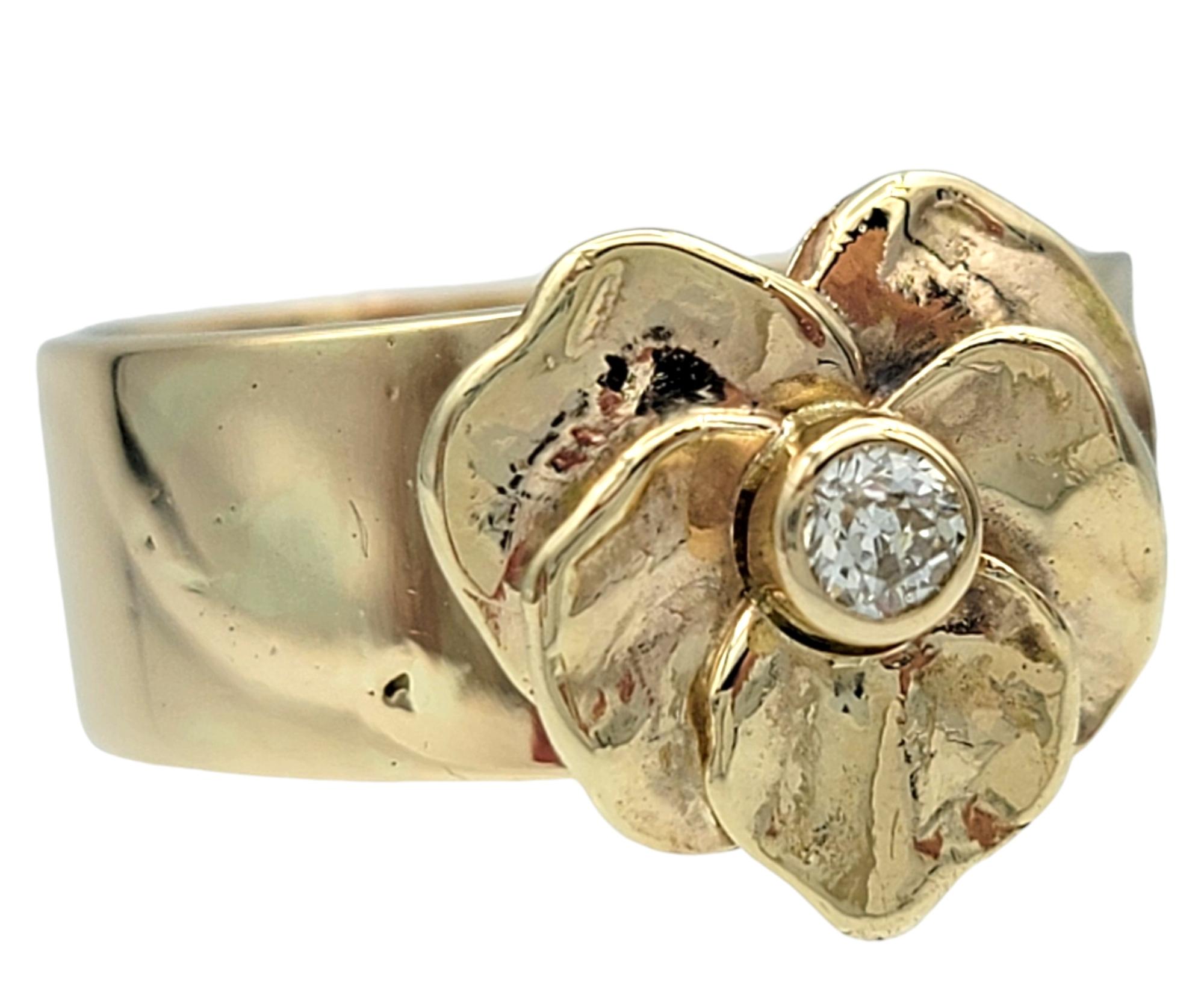 Ring Size: 7

Embrace the organic elegance of nature with this stunning leaf band ring, crafted in luxurious 14 karat yellow gold. This unique piece showcases a beautifully detailed leaf motif, artfully wrapping around the wide band to create an
