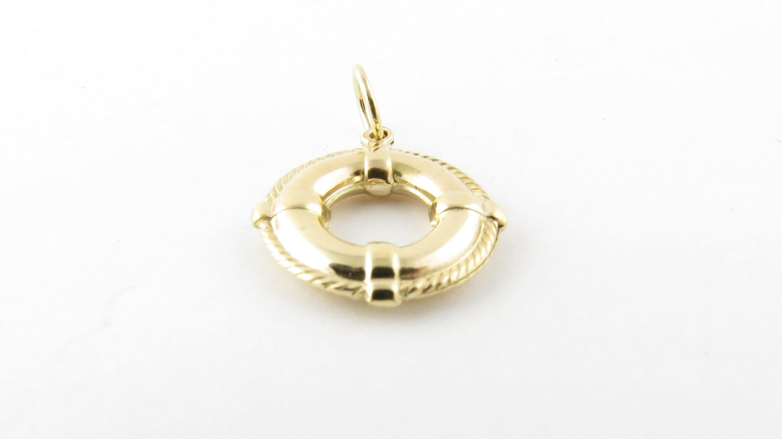 Vintage 14 Karat Yellow Gold Life Preserver Charm - Ahoy! This lovely 3D charm features a miniature life preserver meticulously detailed in 14K yellow gold.
Size: 16 mm x 16 mm (actual charm) Weight: 1.0 dwt./1.6 gr. Acid tested for 14K gold. Very