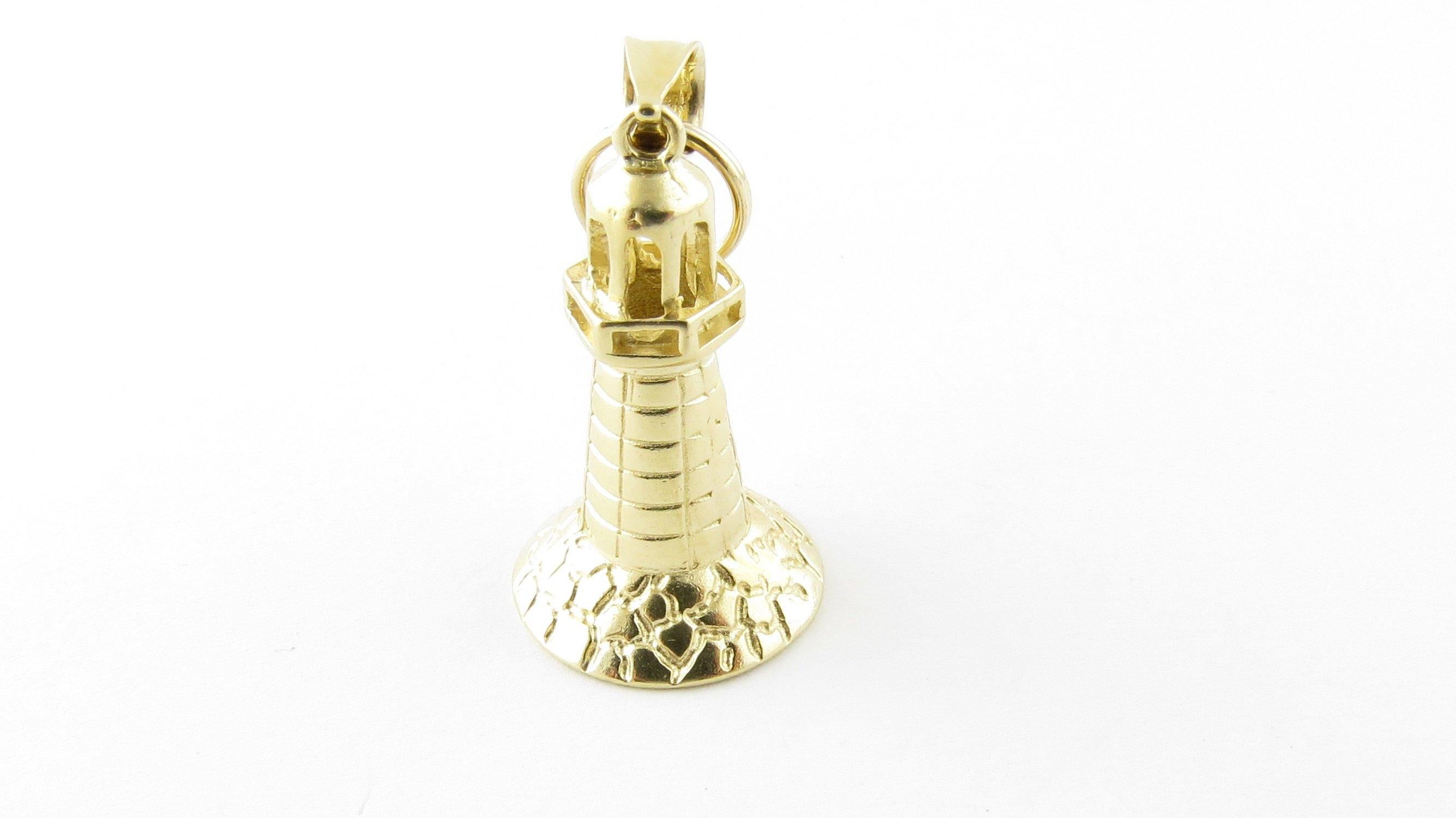 Vintage 14 Karat Yellow Gold Lighthouse Charm. Lighthouses have always symbolize hope and refuge for sailors. This lovely 3D charm features a miniature lighthouse meticulously detailed in 14K yellow gold.
Size: 25 mm x 15 mm (actual charm) Weight: