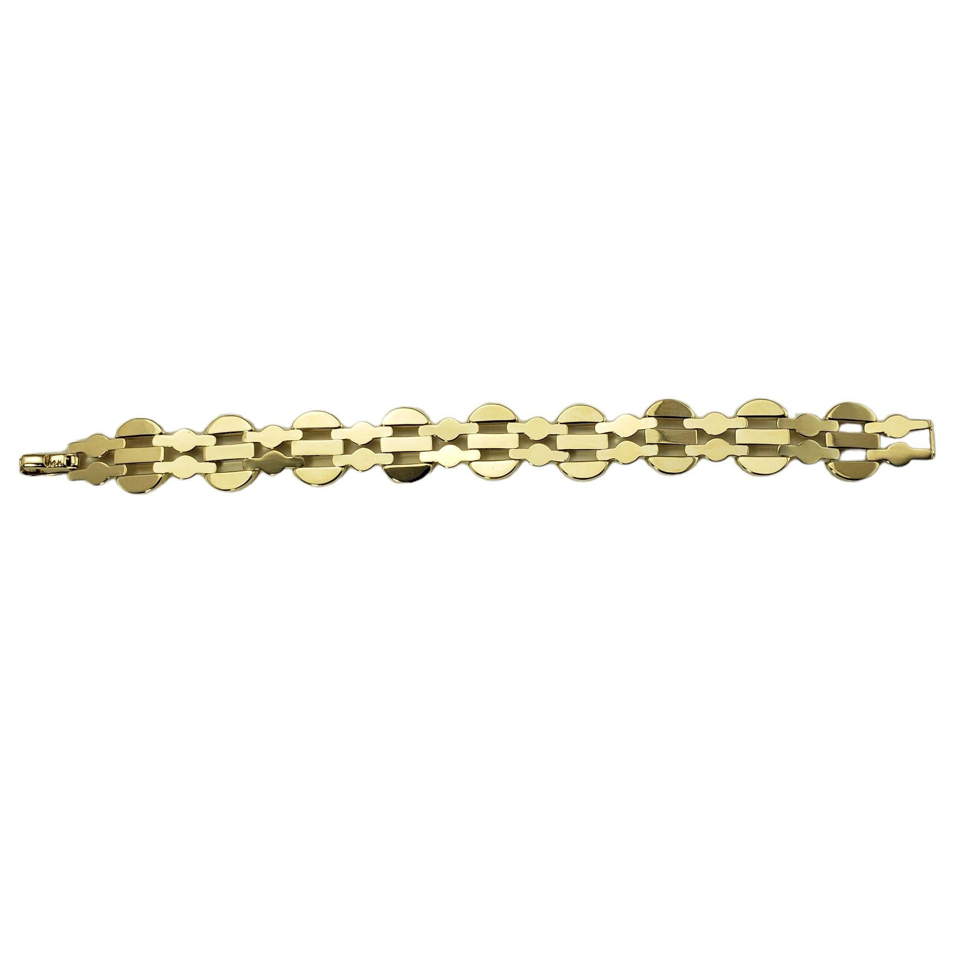 Vintage 14 Karat Yellow Gold Link Bracelet-

This lovely bracelet is crafted in beautifully detailed 14K yellow gold. Width: 8 mm.

Size: 7 inches

Weight: 9.8 dwt. / 15.3 gr.

Stamped: 14K

Very good condition, professionally polished.

Will come
