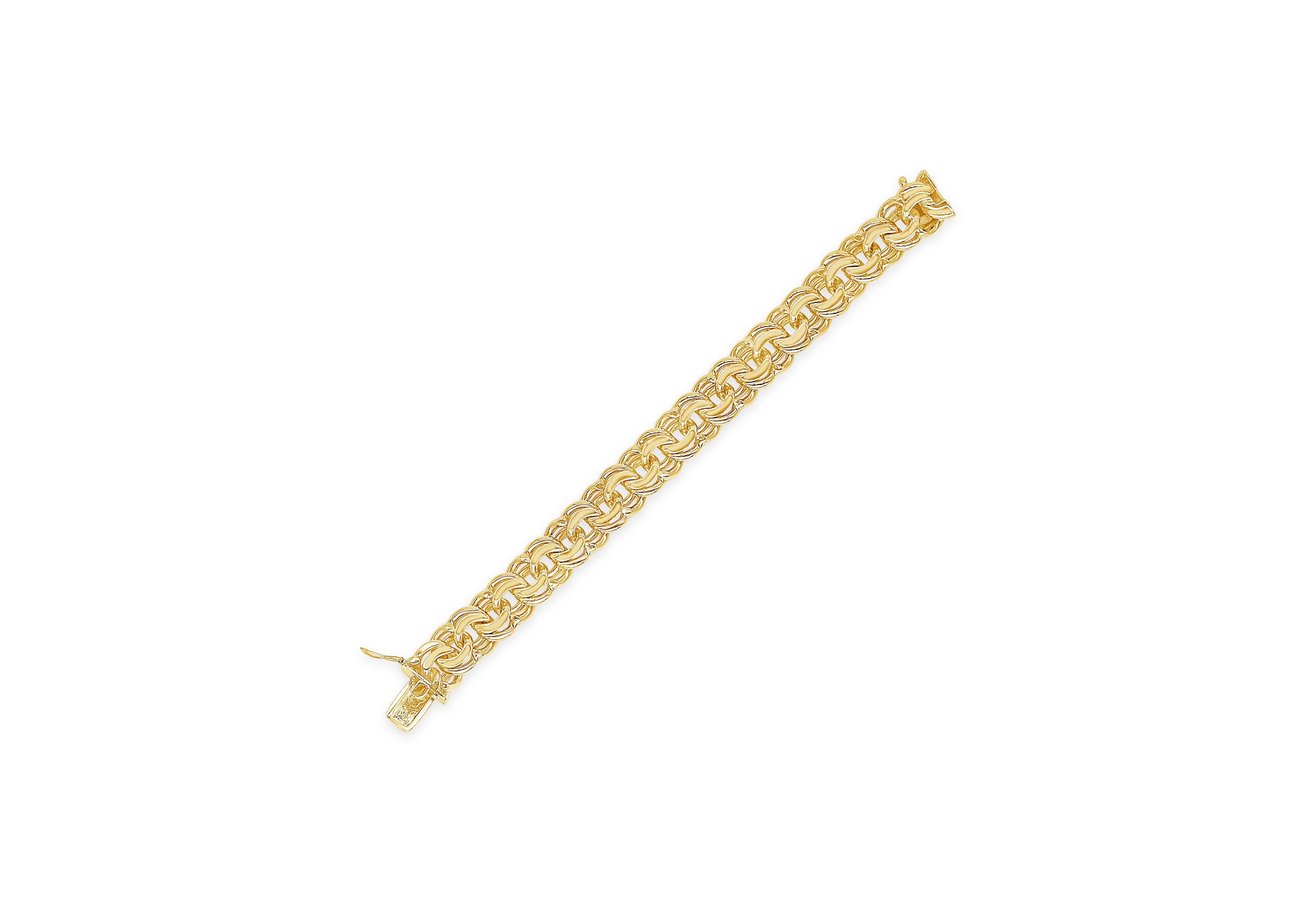 Showcasing intertwined links made in 14 karat yellow gold. 

Weight: 69.15 grams
Length: 7.25 inches
Width: 0.53 inches

