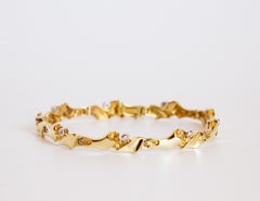14 Karat Yellow Gold Link Bracelet with Diamonds