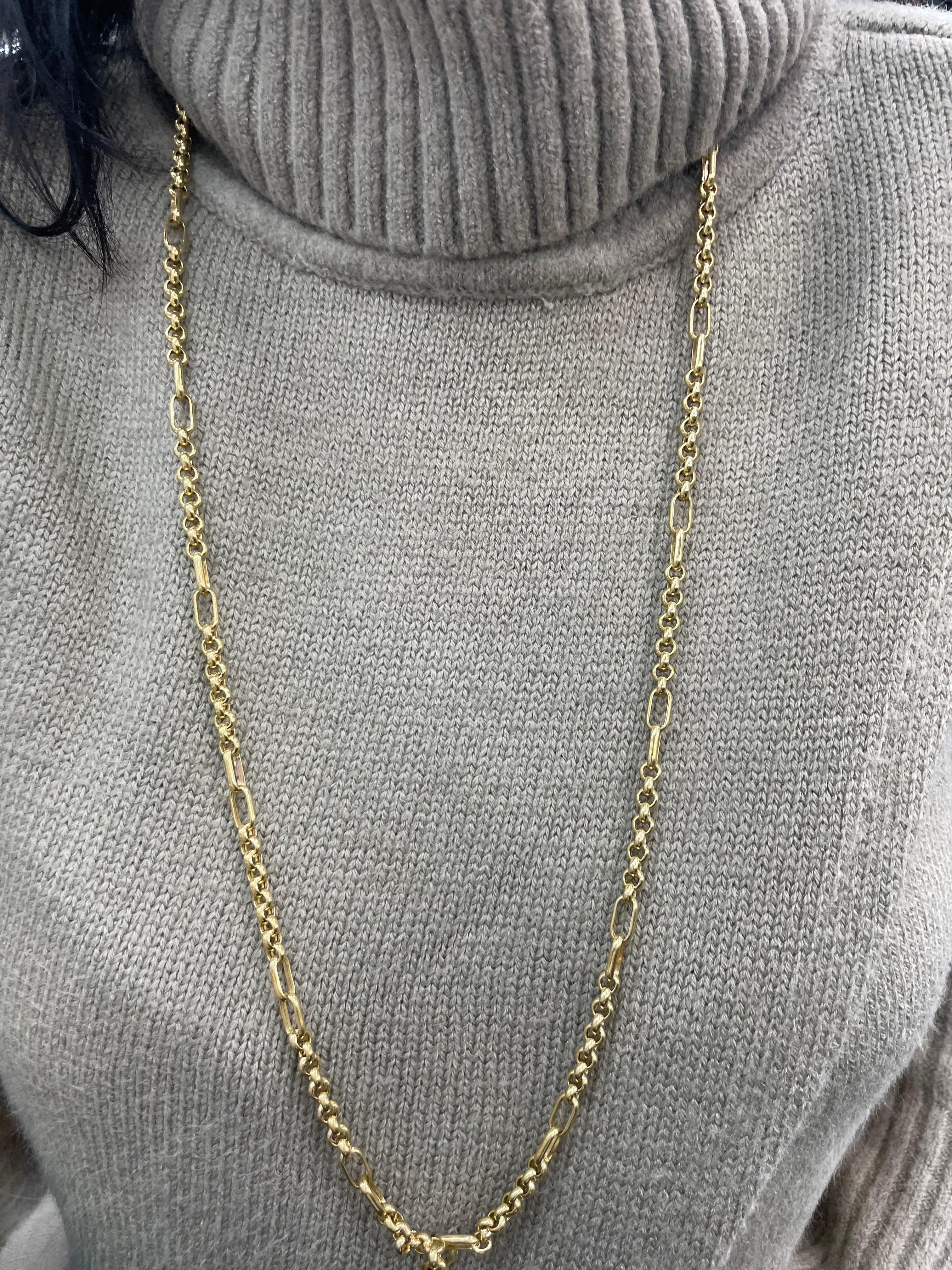 14 Karat Yellow Gold link necklace weighing 25.6 grams and 36.5 inches.
Can be wrapped twice around the neck.