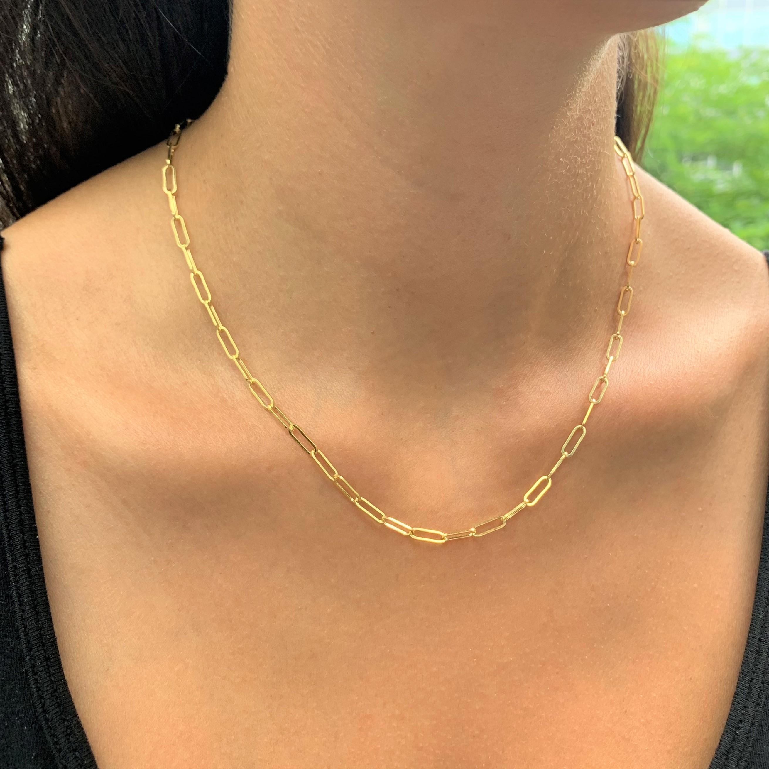 This 14k yellow gold paper-clip small link chain comes with plenty of options, specifically your choice of length. Buy one and wear it as a simple standalone (with or without a pendant) or pick up multiple chains of varying lengths to create a