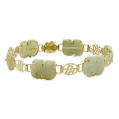 Bracciale in oro giallo 14 carati con elefante asiatico di giada collegato