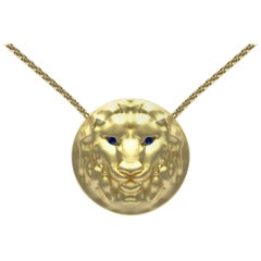 14 Karat Yellow Gold Lion Pendant Womens Necklace with Sapphire Eyes