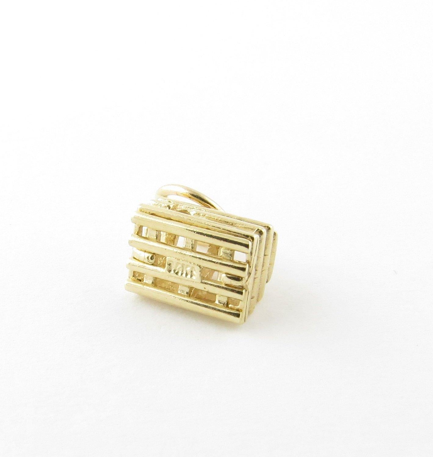 Vintage 14 Karat Yellow Gold Lobster Trap Charm. This lovely 3D charm features a miniature lobster trap meticulously detailed in 14K yellow gold.
Size: 8 mm x 8 mm (actual charm) Weight: 0.6 dwt. / 1.0 gr. Stamped: 14K Very good condition,