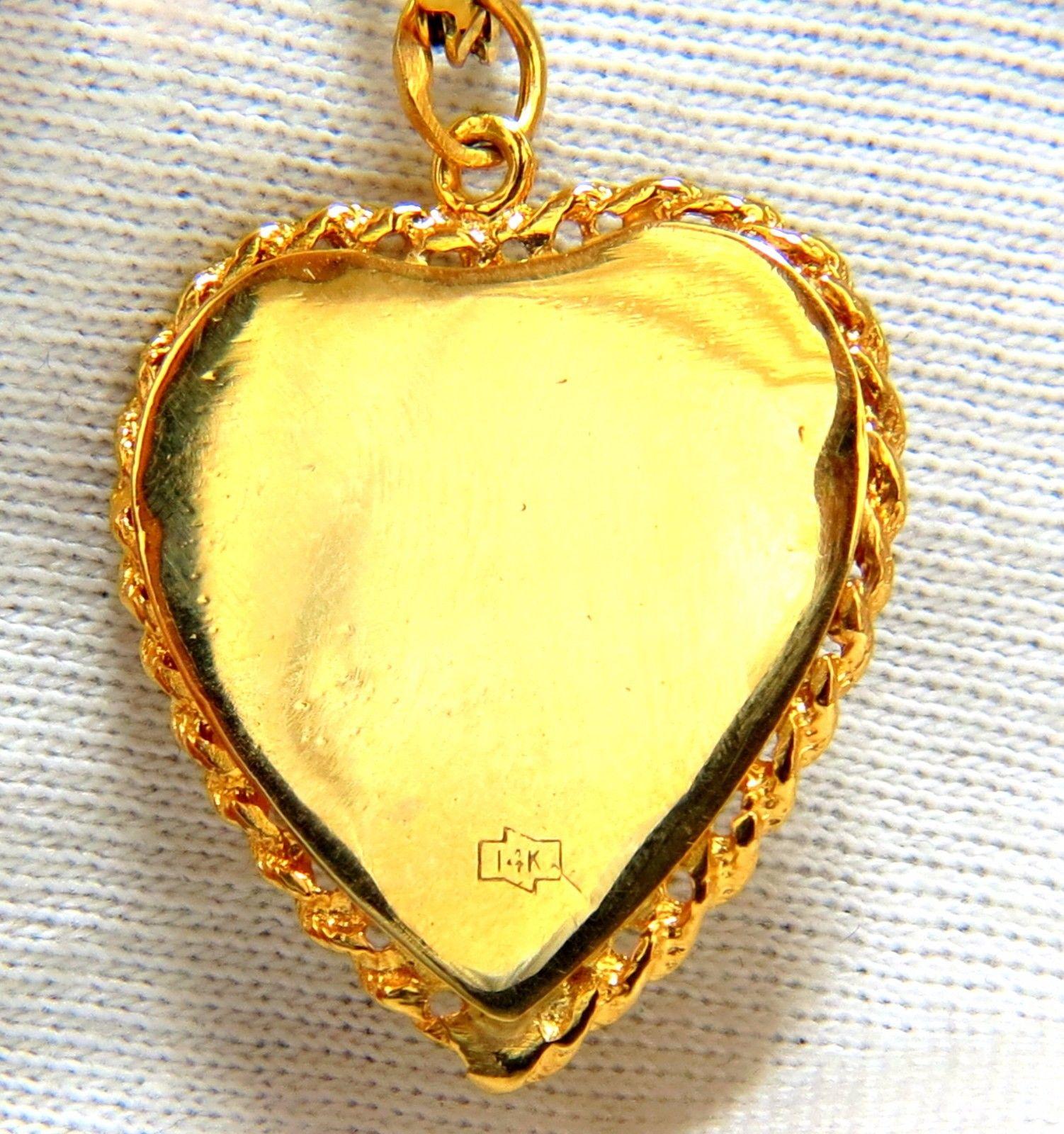 Classic Heart Locket

1.16 X 1.03 inch

Necklace: 15.5 inch

14Kt Yellow Gold

Grand Weight: 14.6 Grams