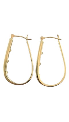 14 Karat Yellow Gold Long Oval Diamond Hoop Earrings #17716