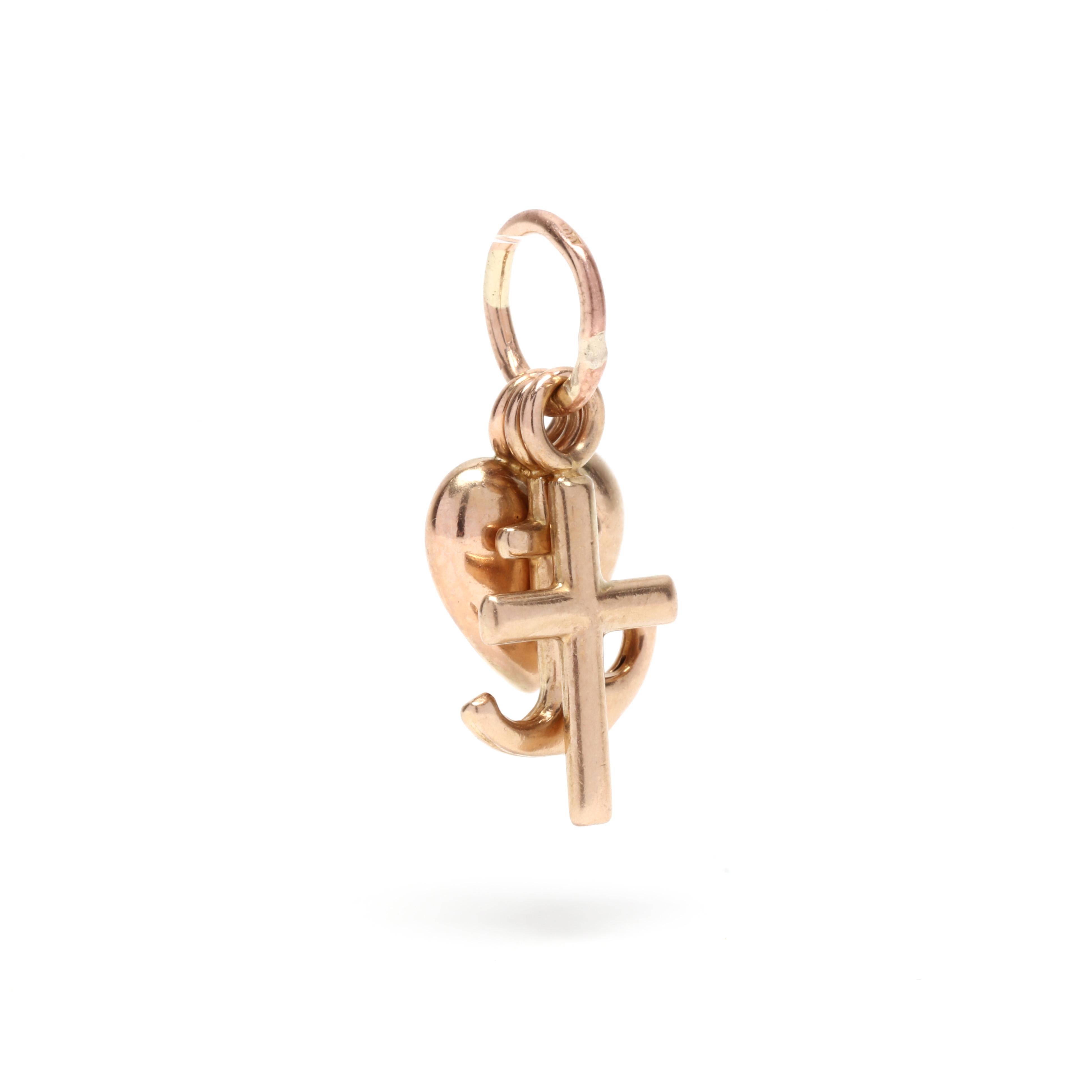 A vintage 14 karat yellow gold love, faith and hope charm. This charm features a miniature puffed heart, miniature cross, and a miniature anchor connected together with one ring.



Length: 3/4 in.



Width: 1/4 in.



Weight: .60 dwts.
