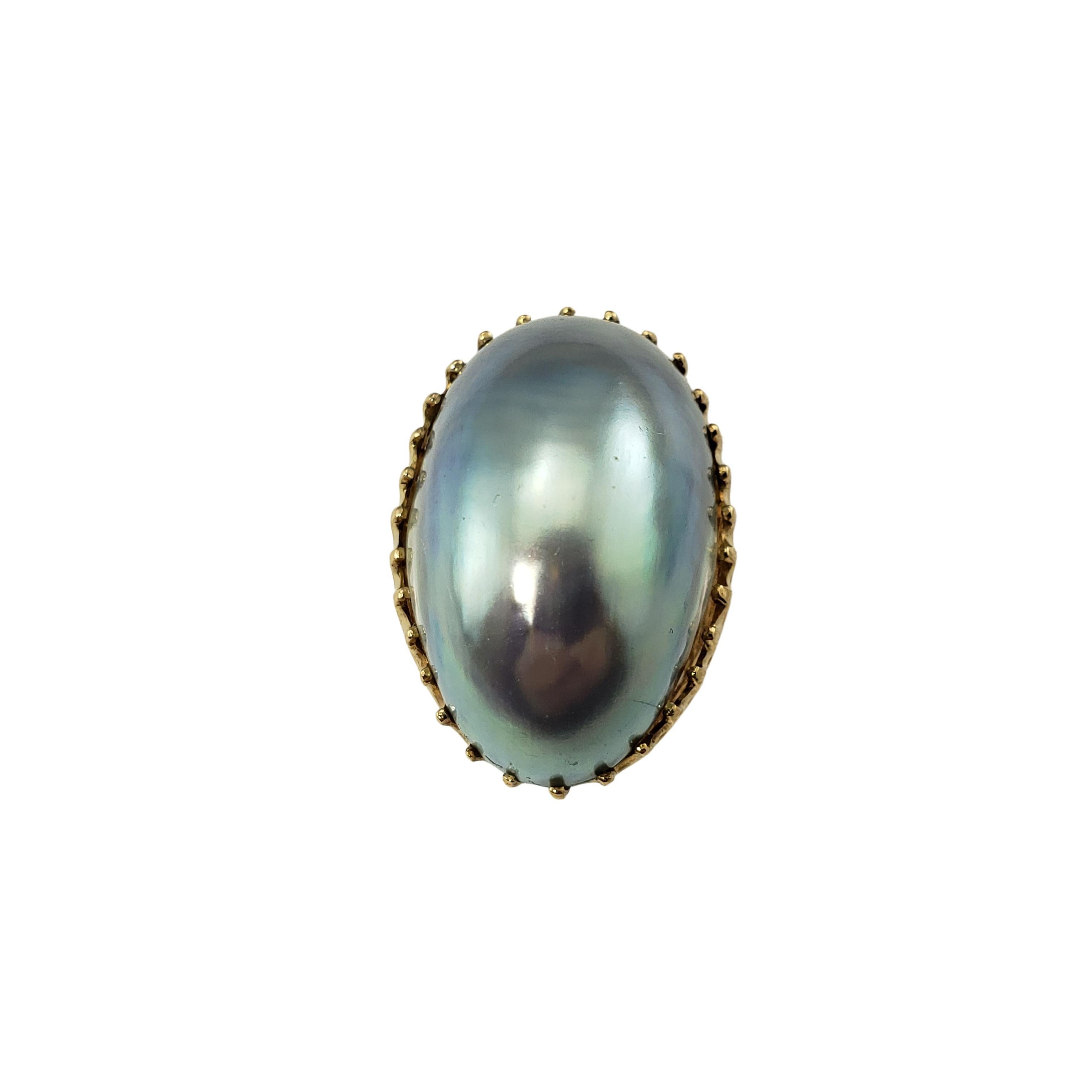 Vintage 14 Karat Yellow Gold and Mabe Grey Pearl Ring Size 5.25-

This stunning ring features one oval Mabe pearl (27 mm x 16 mm) set in beautifully detailed 14K yellow gold. Height: 17 mm.
Shank: 2 mm.

Size: 5.25

Weight: 7.5 dwt. / 7.5