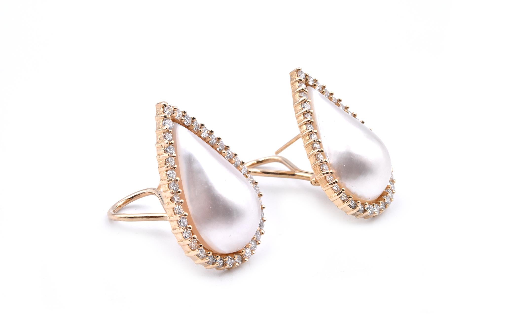 Designer: custom designed
Material: 14k yellow gold
Pearls: 2  pear shaped mabe pearls
Diamonds: 68 round cut = 1.36cttw
Color: G
Clarity: VS
Fastenings: posts with omega backs
Dimensions: earrings measure 27.3 X 18.2 
Weight: 11.22 grams
