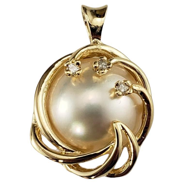 14 Karat Yellow Gold Mabe Pearl and Diamond Pendant #16727 For Sale