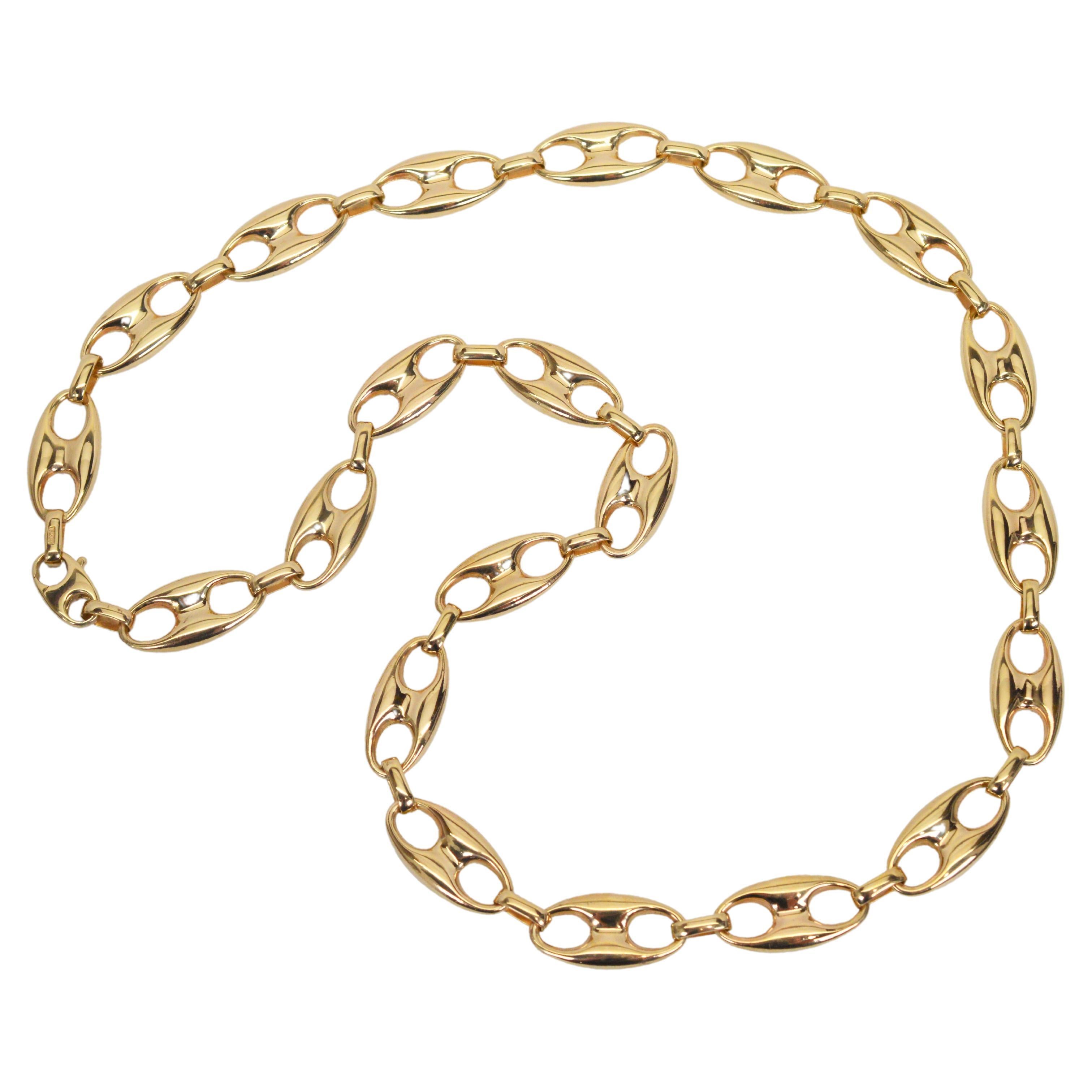 A timeless bold accent to brighten even the simplest of outfits. In fourteen karat yellow gold 14K, generously sized Mariner style chain links measuring 23mm x 12mm create this versatile 24 inch necklace.  Finely crafted in Italy and finished with a