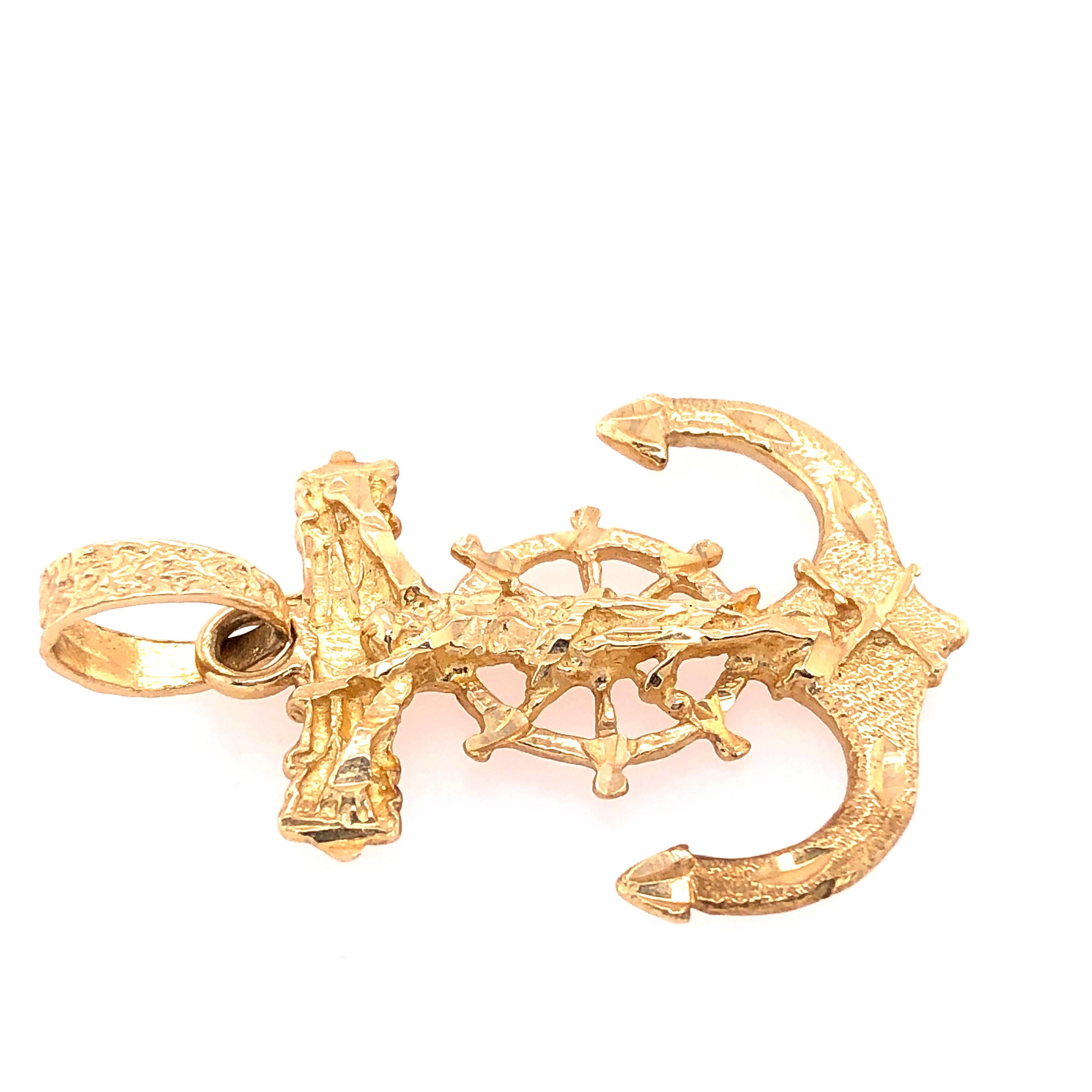 Ciondolo / Charm marittimo in oro giallo 14 carati - Ancora 
5,2 grammi di peso totale.
Altezza: 40 mm
Peso: 28 mm