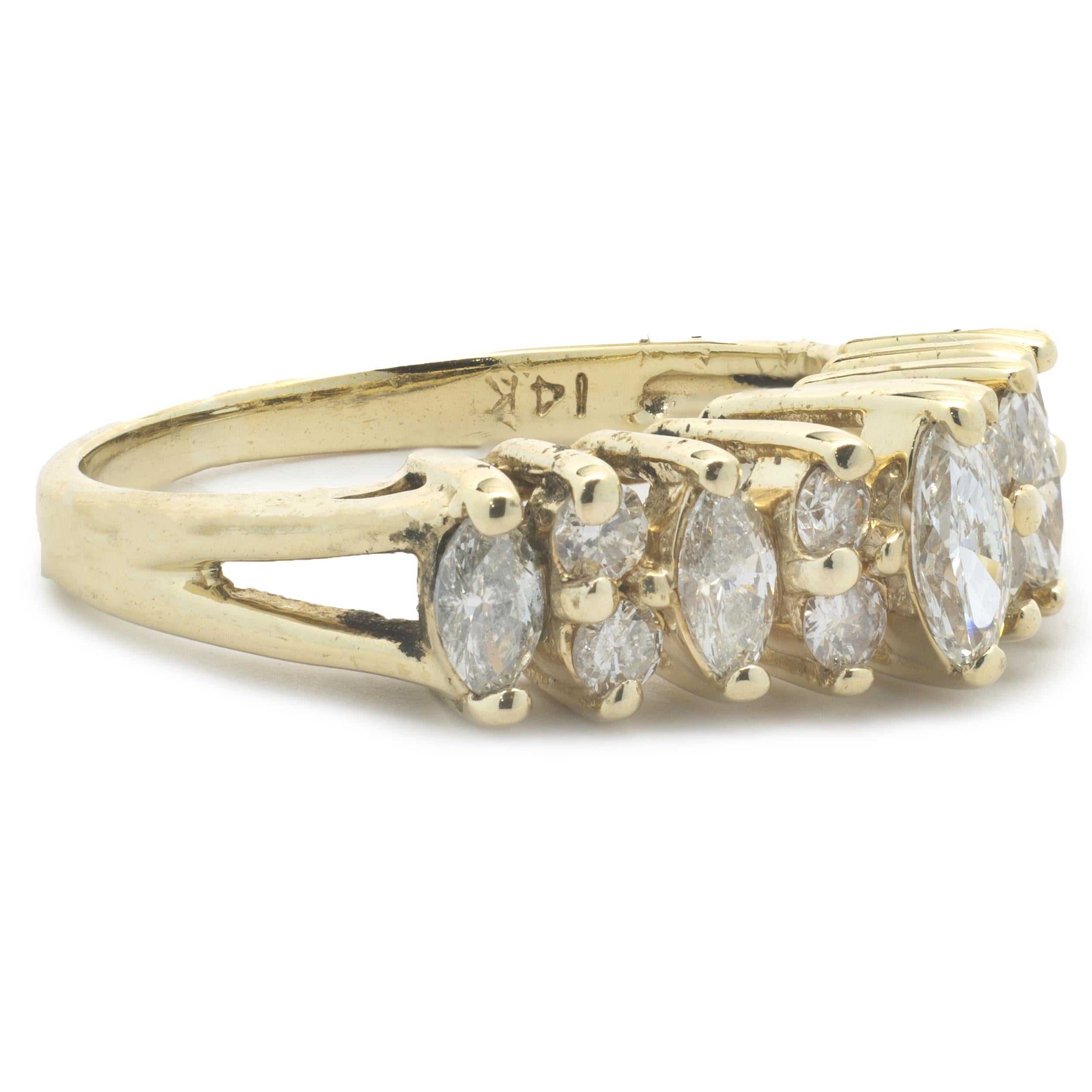 Designer: custom
Material: 14K yellow gold
Diamond: 5 marquise cut = 0.60cttw
Color: G
Clarity: SI1
Diamond: 8 round brilliant cut = 0.40cttw
Color: G/H
Clarity: SI1-2
Ring size: 6 (please allow two additional shipping days for sizing
