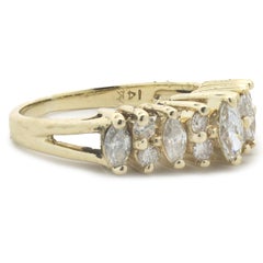 14 Karat Yellow Gold Marquise and Round Brilliant Cut Diamond Waterfall Ring