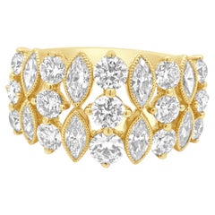 14 Karat Yellow Gold Marquise Cut and Round Diamond Ring