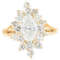 14 Karat Yellow Gold Marquise Cut Diamond Cocktail Ring with Diamond Halo