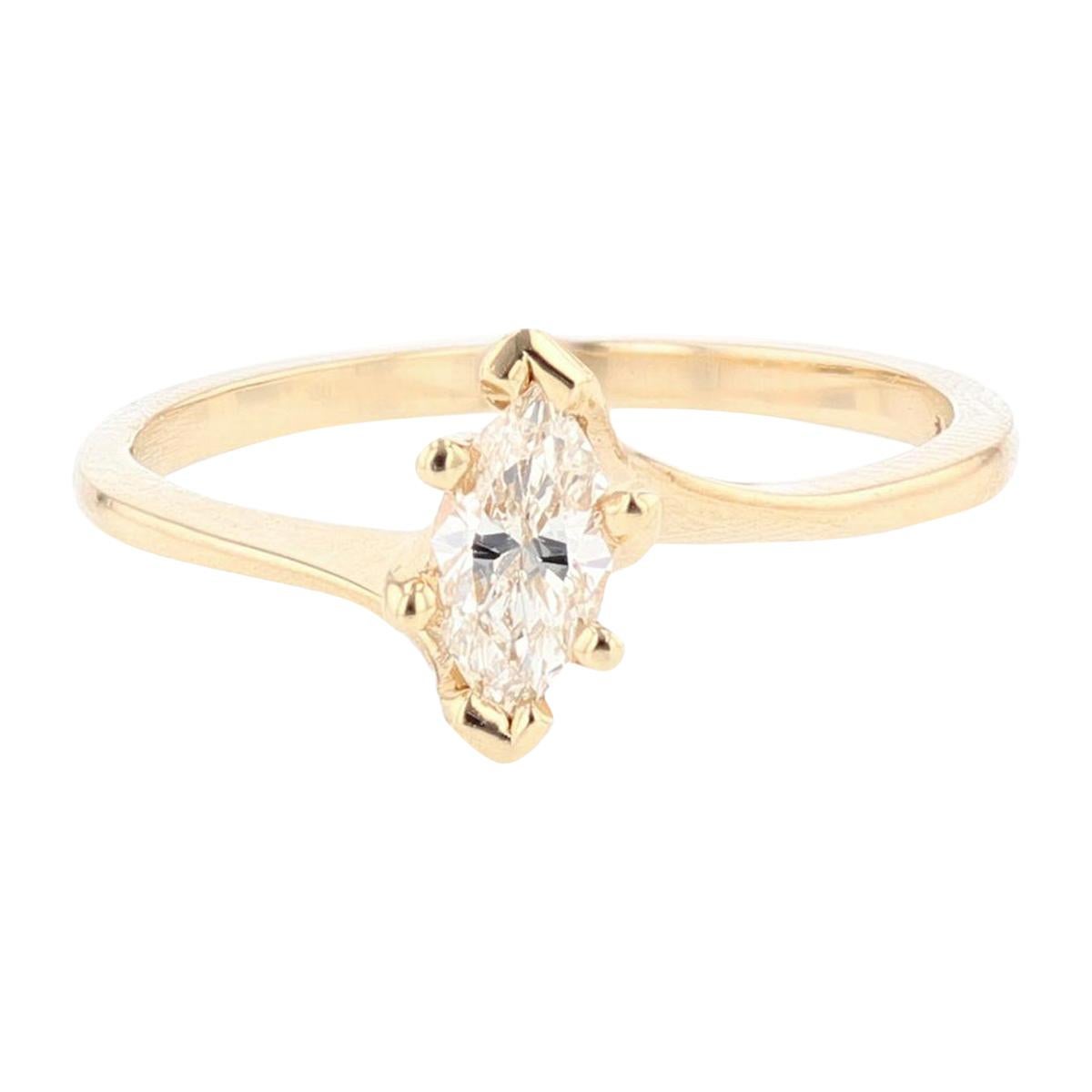 14 Karat Yellow Gold Marquise Diamond Solitaire Engagement Ring For Sale