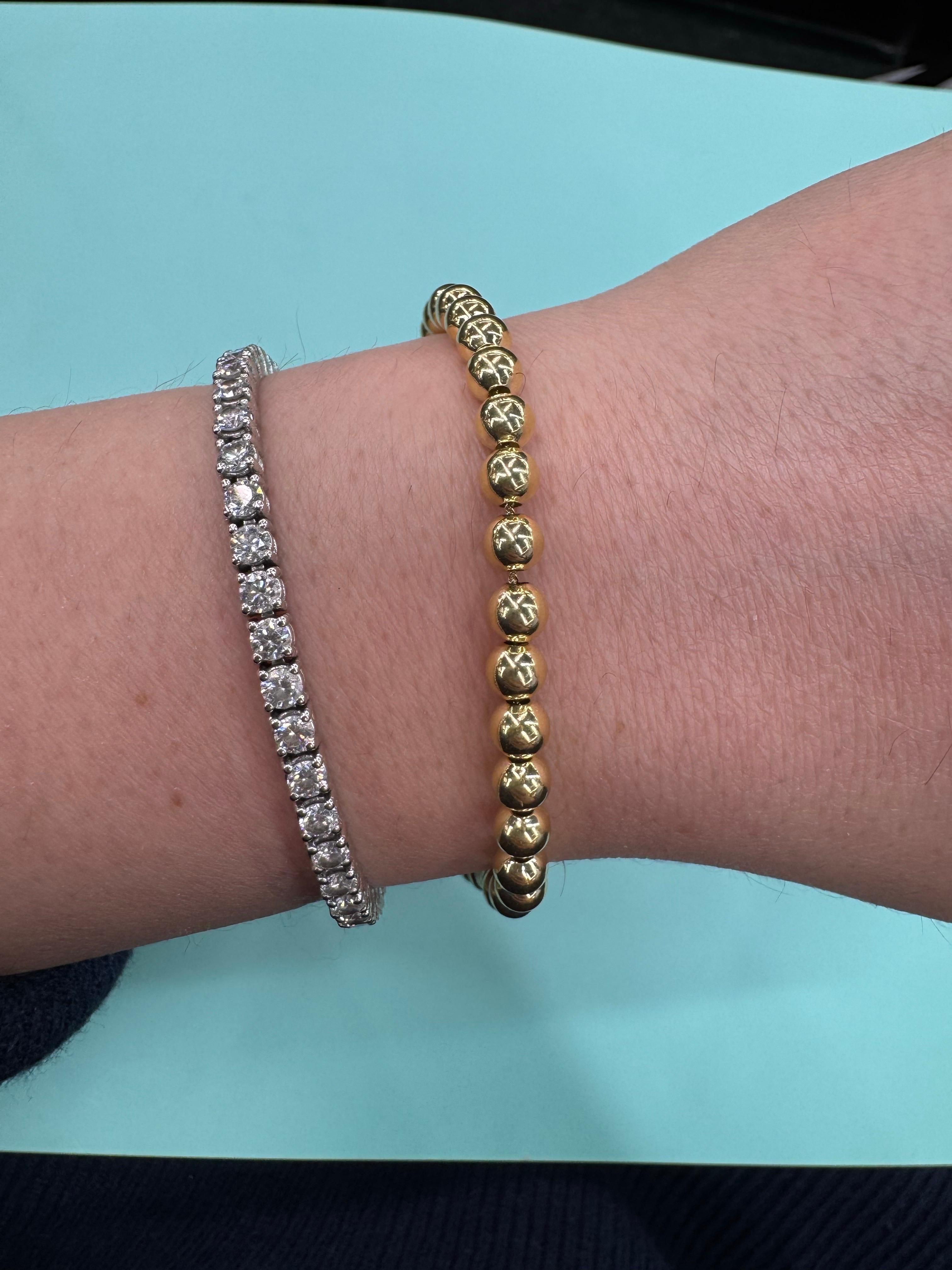 Perlenarmband aus 14 Karat Gelbgold mit 38 hochglanzpolierten Kugeln an einem Kettenarmband, 5 mm, 5,07 Gramm.

Erhältlich in kleineren und größeren MM-Größen.
Nachricht für weitere Bilder und Informationen. 

