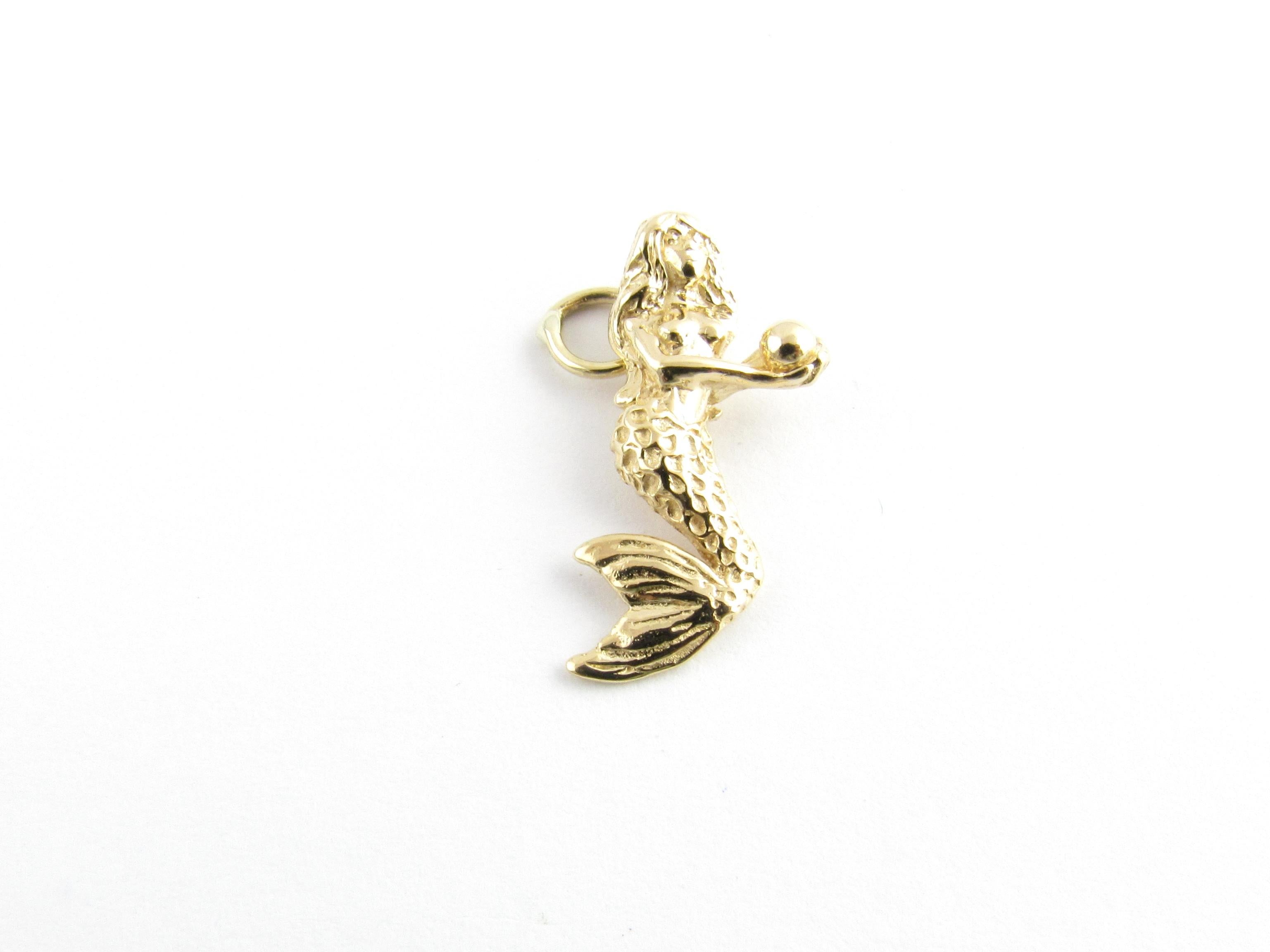 Vintage 14 Karat Yellow Gold Mermaid Charm

The legendary mermaid have fascinated people for centuries.

This lovely charm features a beautifully detailed mermaid crafted in classic 14K yellow gold.

Size: 23 mm x 10 mm (actual charm)

Weight: 1.4
