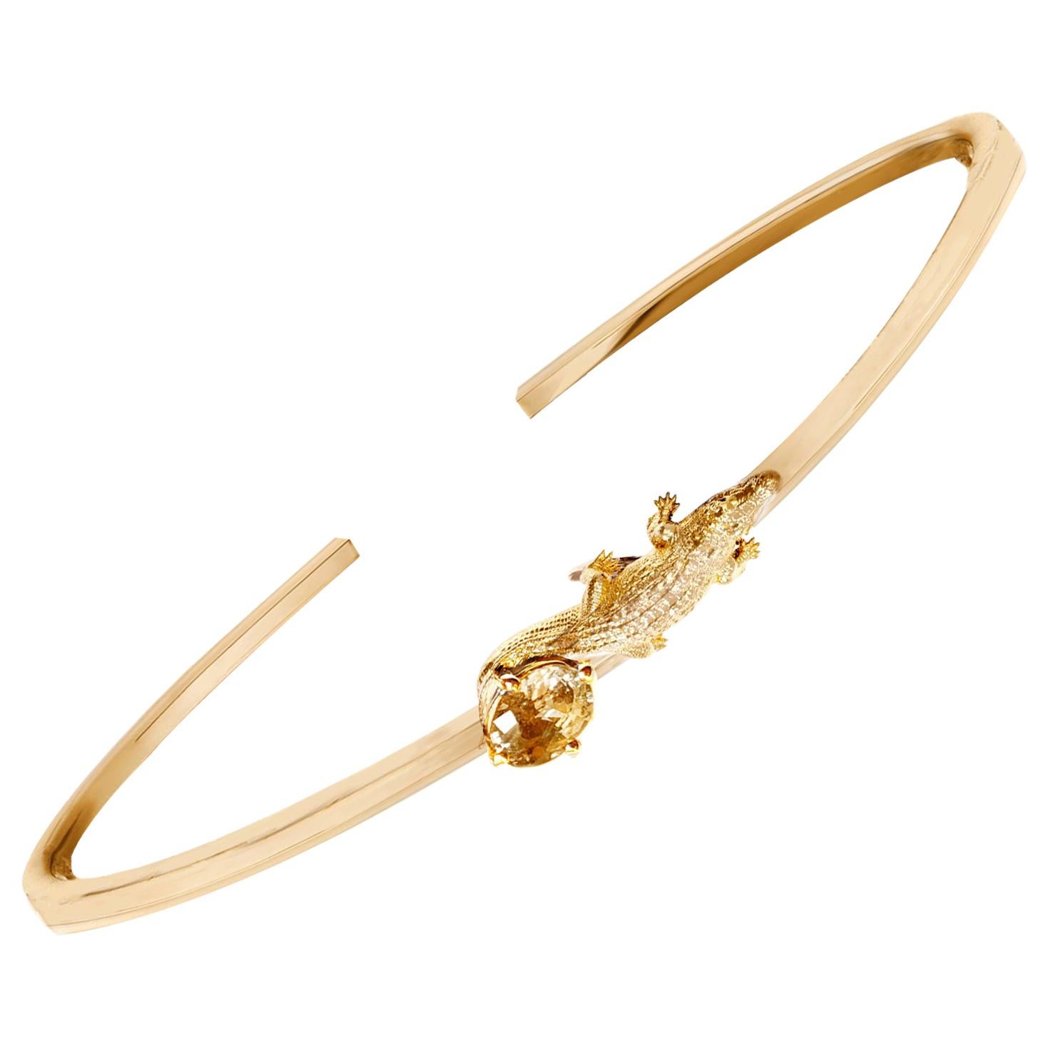 Yellow Gold Mesopotamian Bracelet with Natural Oval Yellow Sapphire