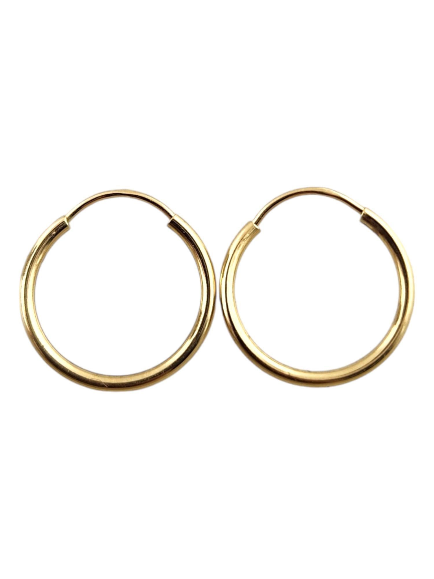 Pendientes de aro mini círculo de oro amarillo de 14 quilates #19191 en venta 4