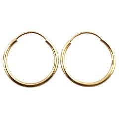 14 Karat Gelbgold Mini-Ohrringe mit kreisförmigem Creolen #19191