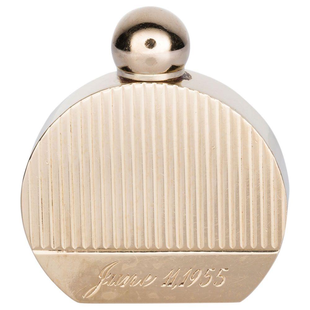 A beautiful miniature perfume bottle fashioned from 14k high polish yellow gold.  The front and back show line detail on three quarters of the bottle with a line towards the bottom under which is hand engraved June 11, 1955 on the lower section.
The
