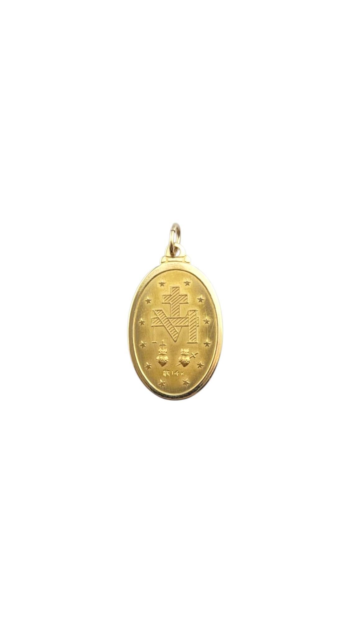 Pendentif Médaille Miraculeuse en or jaune 14 carats - 14 Karat Solid Gold

Gracieux, sacré et doré - ce pendentif médaille de la Sainte Vierge Marie en or jaune 14 carats porte l'inscription sincère 