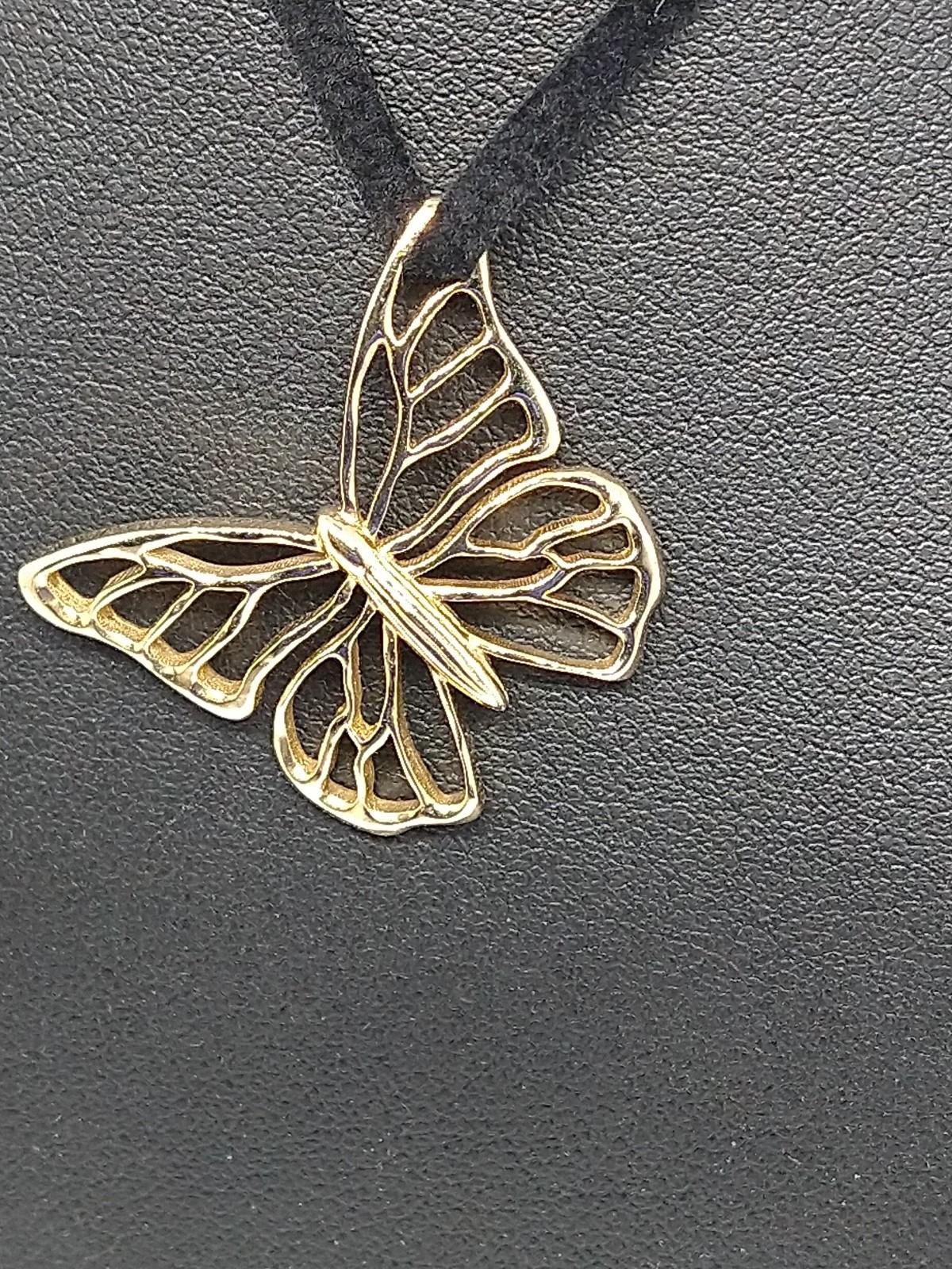14 Karat Yellow Gold Petite Monarch Butterfly Pendant Necklace, Tiffany Designer, Thomas Kurilla sculpted this butterfly pendant for the new Fall season. Butterflies have always captured the imagination of designers with their amazing patterns and