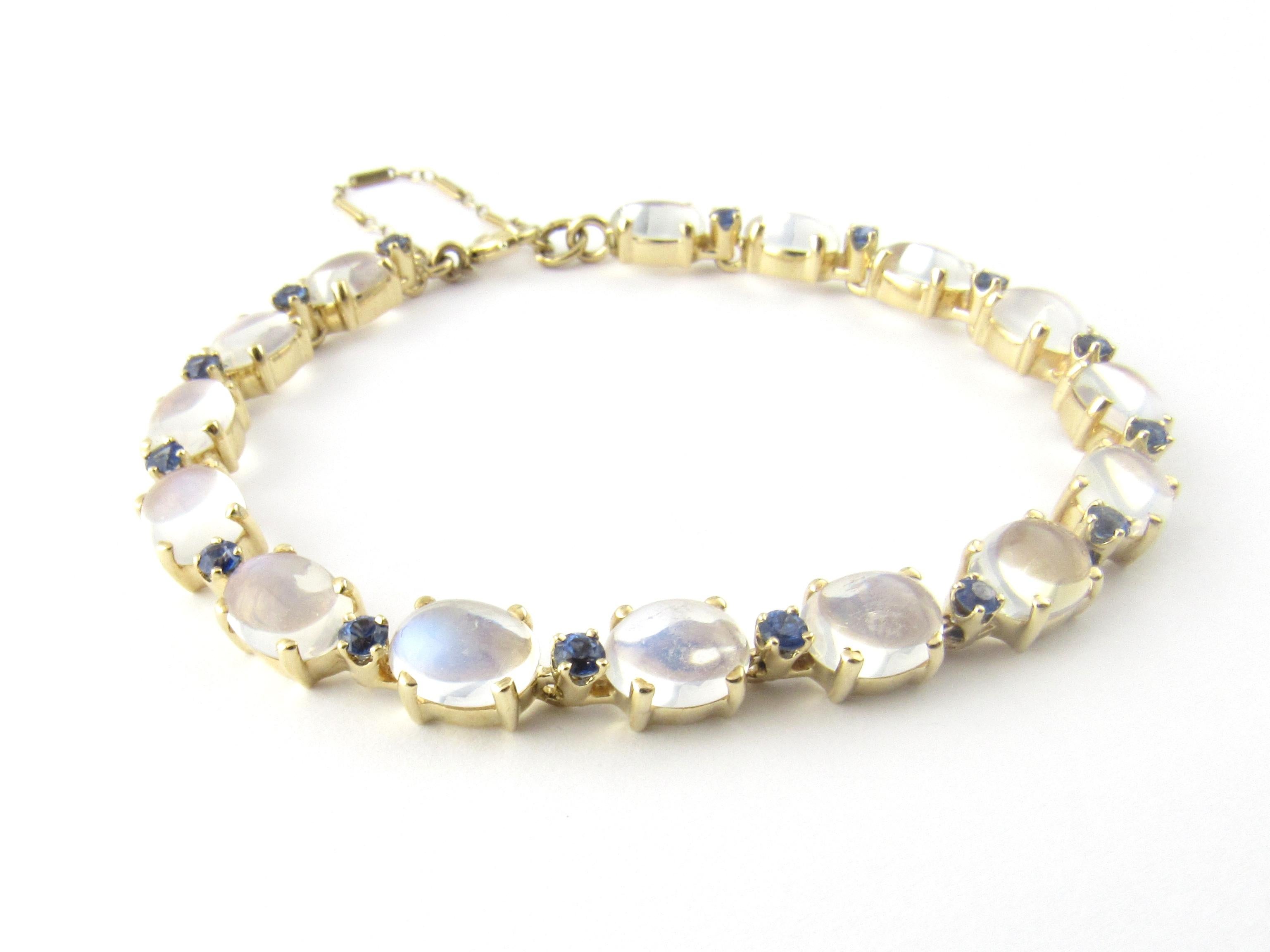14 Karat Yellow Gold Moonstone and Sapphire Bracelet -

This stunning bracelet features 15 oval genuine moonstones (8 mm x 6 mm) and 15 genuine sapphires (3 mm each)
set in classic 14K yellow gold.  Safety chain closure.

Size:   7 inches